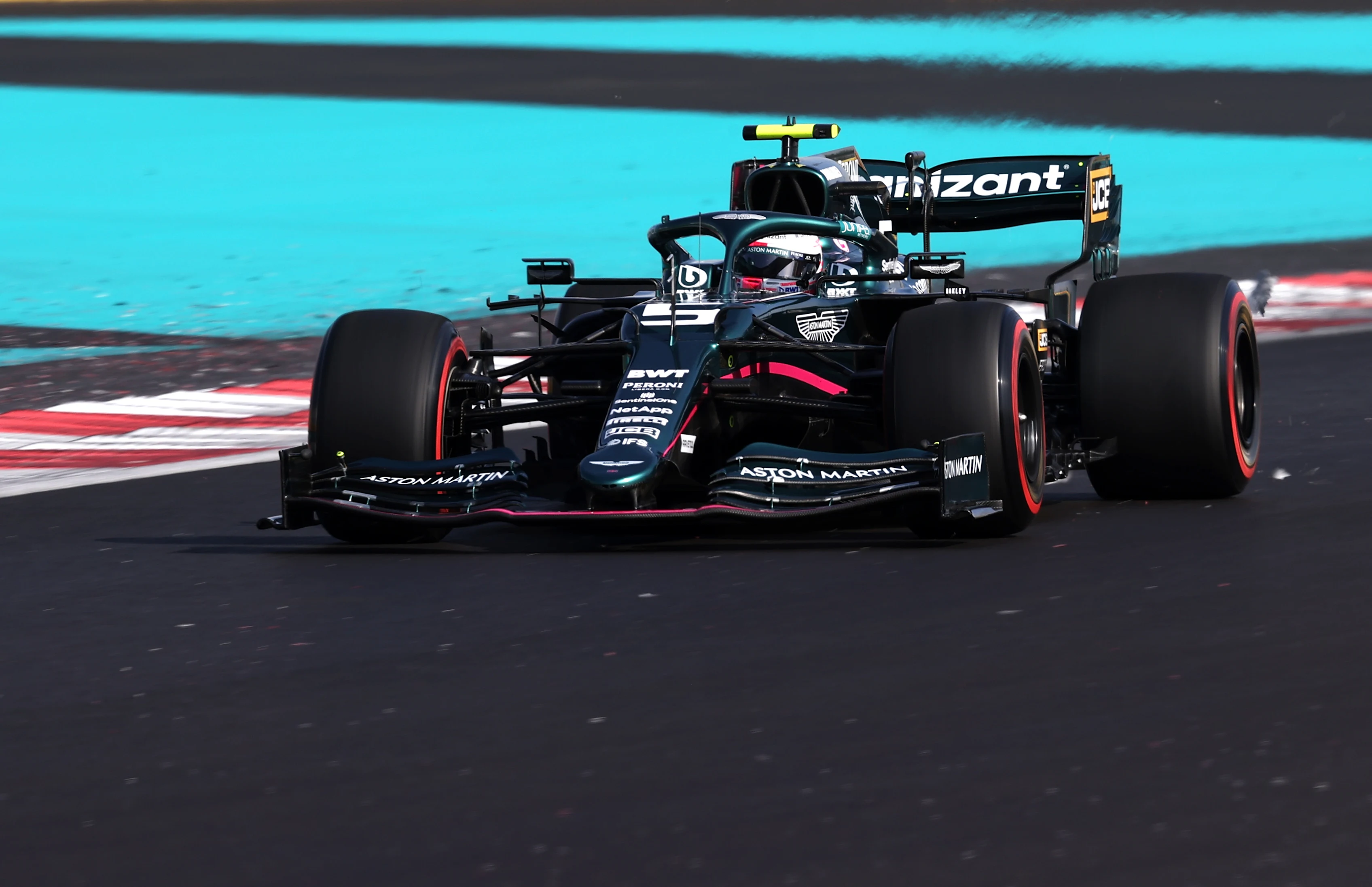 ABU DHABI, UNITED ARAB EMIRATES - DECEMBER 10: Sebastian Vettel of Germany driving the (5) Aston Martin AMR21 Mercedes during practice ahead of the F1 Grand Prix of Abu Dhabi at Yas Marina Circuit on December 10, 2021 in Abu Dhabi, United Arab Emirates. (Photo by Lars Baron/Getty Images)
