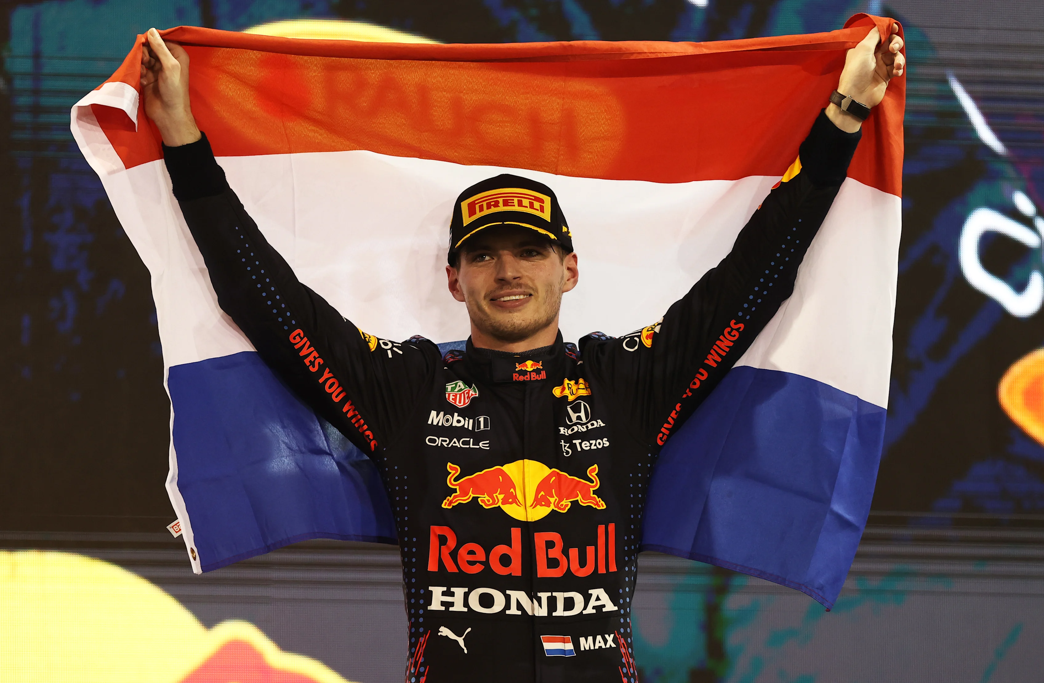 ABU DHABI, UNITED ARAB EMIRATES - DECEMBER 12: Race winner and 2021 F1 World Drivers Champion Max