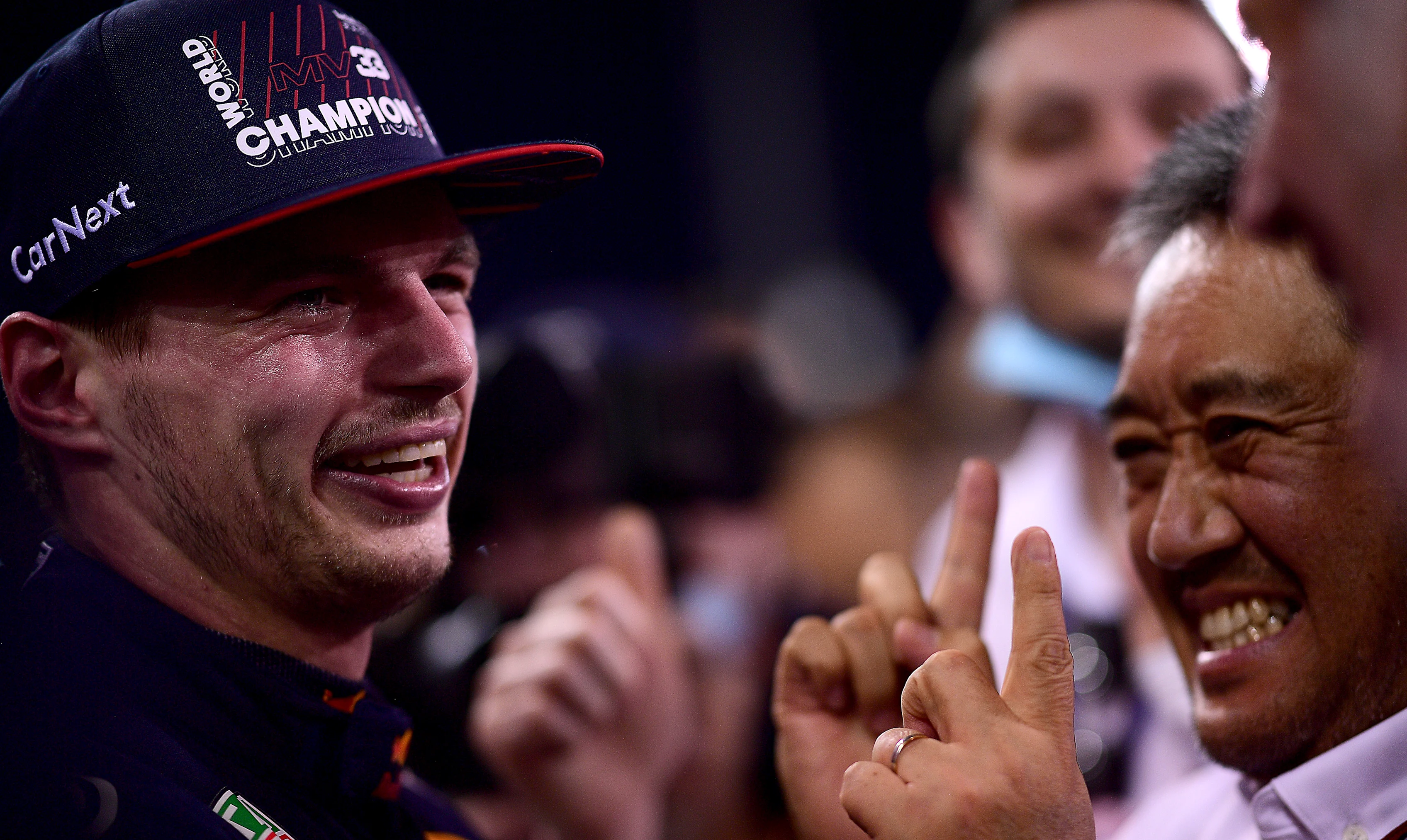 ABU DHABI, UNITED ARAB EMIRATES - DECEMBER 12: Race winner and 2021 F1 World Drivers Champion Max