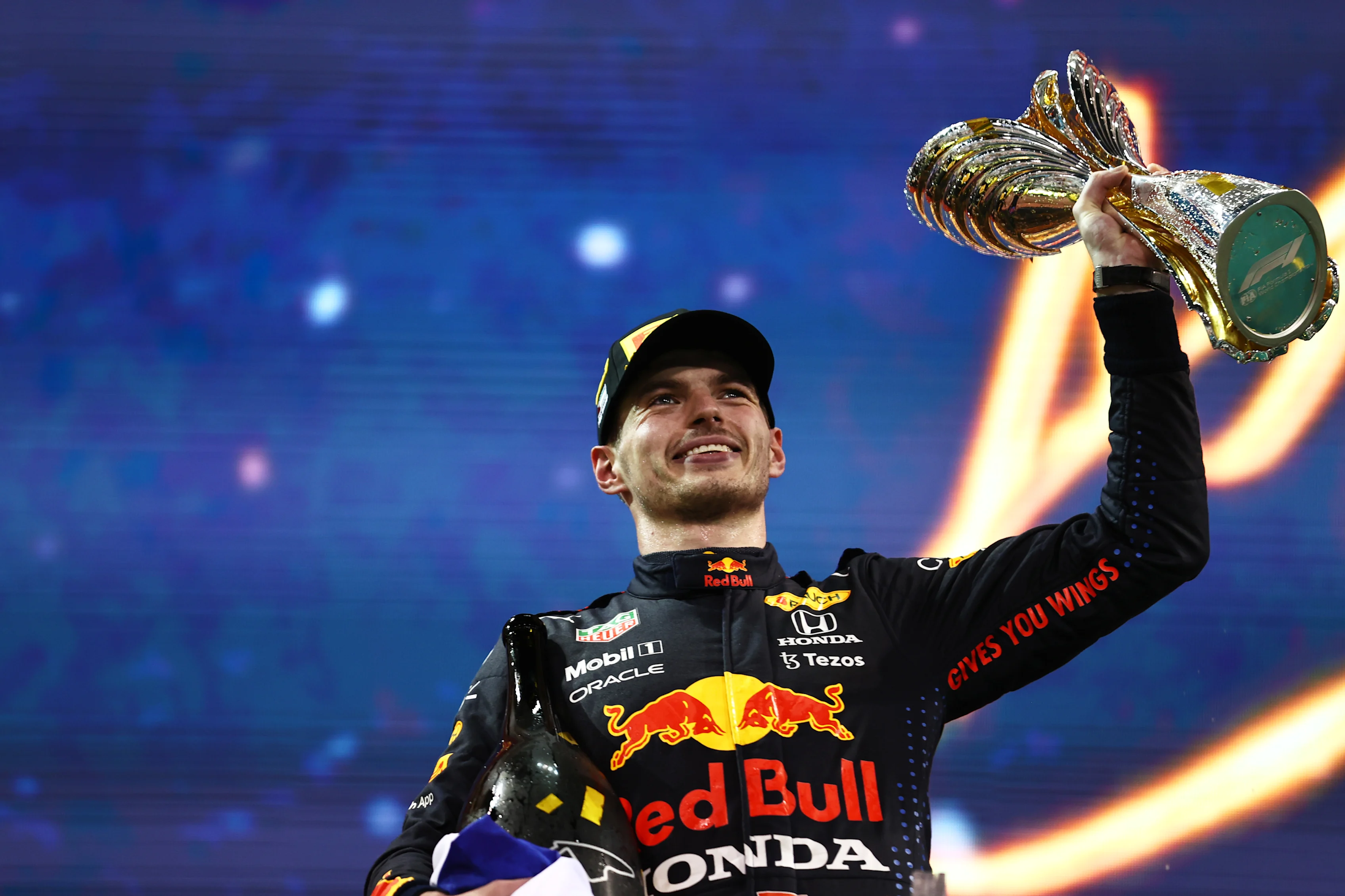 ABU DHABI, UNITED ARAB EMIRATES - DECEMBER 12: Race winner and 2021 F1 World Drivers Champion Max