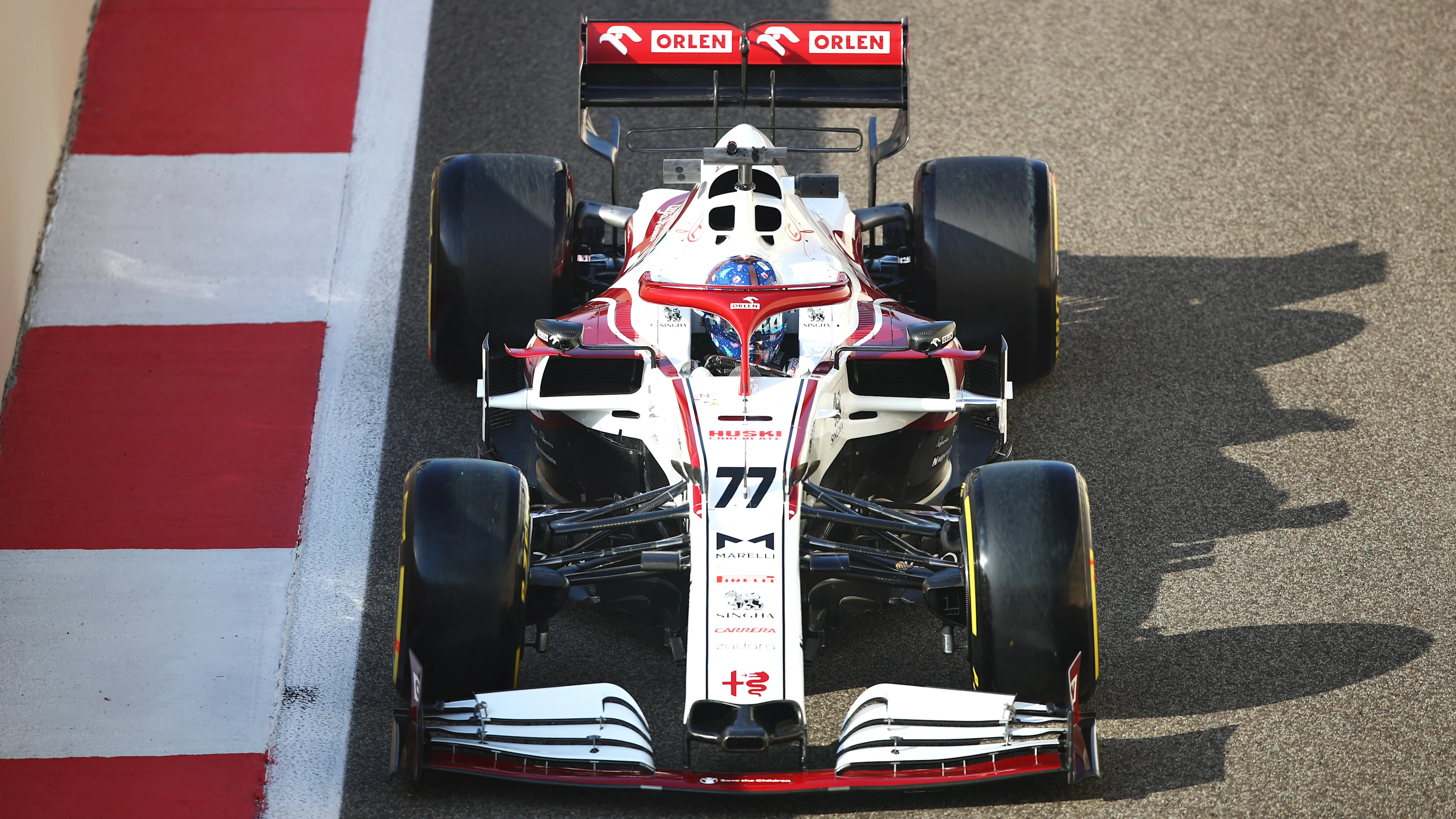 ABU DHABI, UNITED ARAB EMIRATES - DECEMBER 14: Valtteri Bottas of Finland driving the (77) Alfa