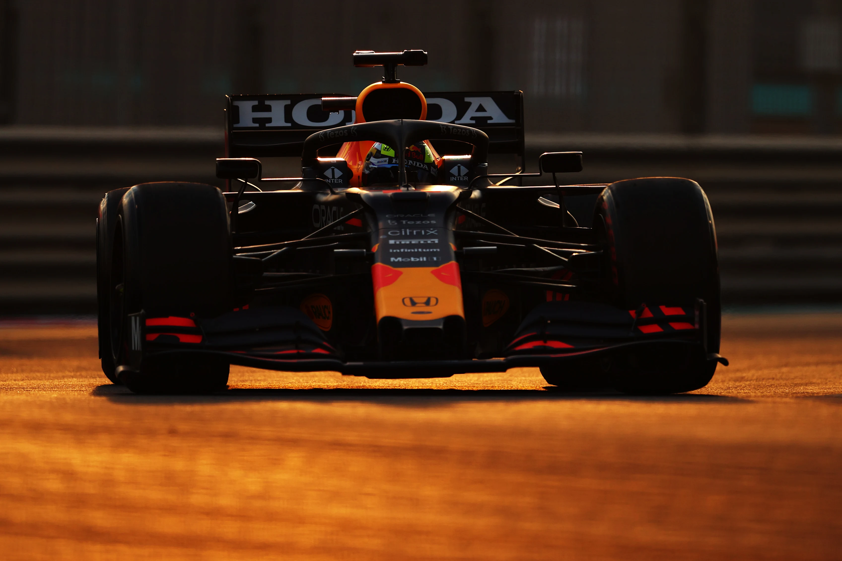 ABU DHABI, UNITED ARAB EMIRATES - DECEMBER 15: Sergio Perez of Mexico driving the (11) Red Bull