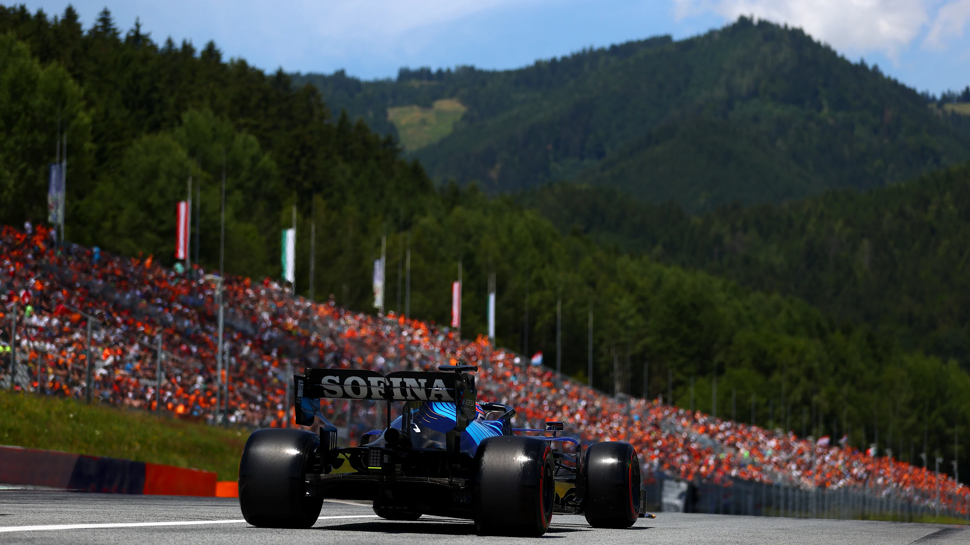 SPIELBERG, AUSTRIA - JULY 03: George Russell of Great Britain driving the (63) Williams Racing