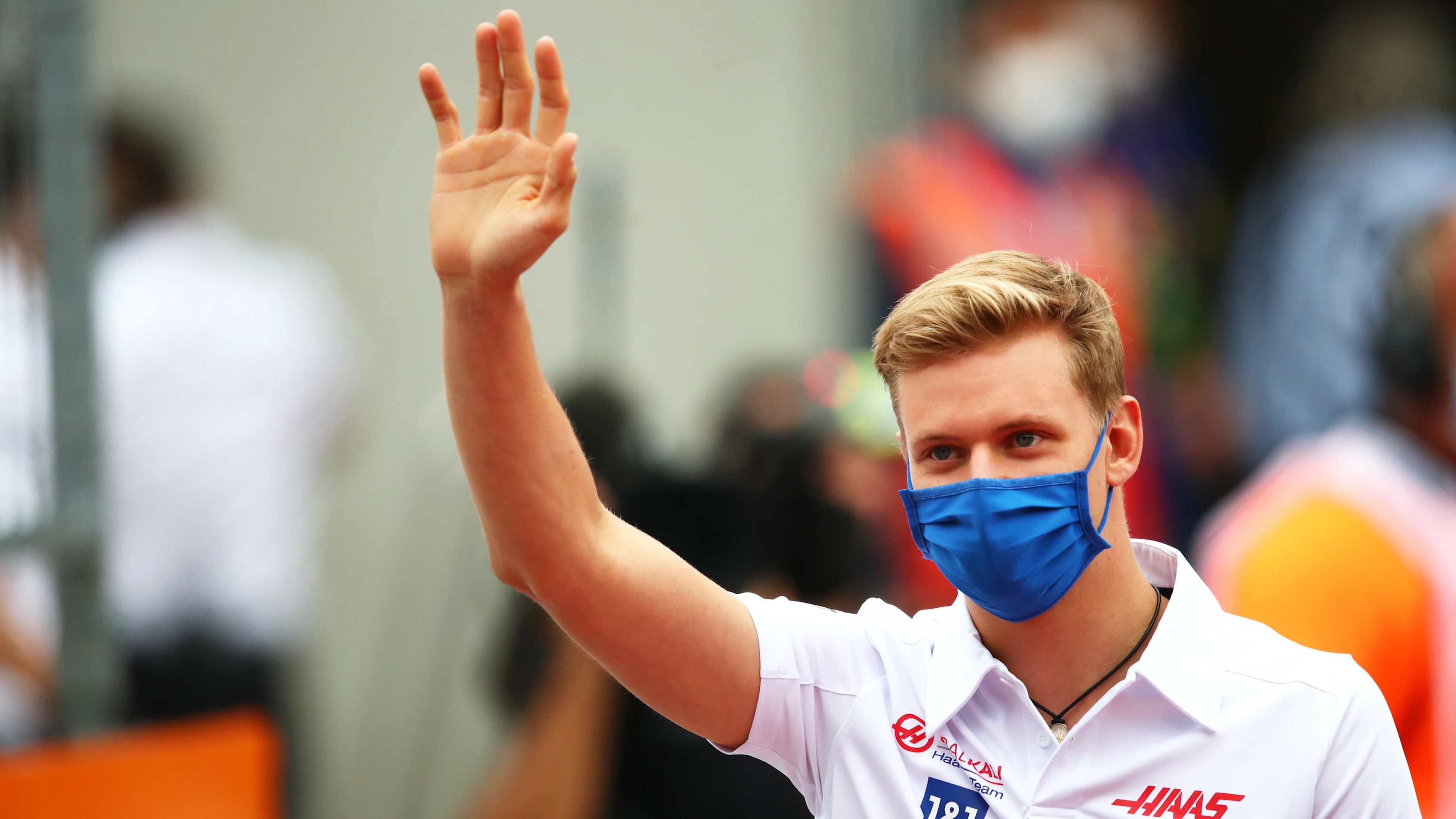 SPIELBERG, AUSTRIA - JULY 04: Mick Schumacher of Germany and Haas F1 waves to the crowd during the drivers parade ahead of the F1 Grand Prix of Austria at Red Bull Ring on July 04, 2021 in Spielberg, Austria. (Photo by Joe Portlock - Formula 1/Formula 1 via Getty Images)
