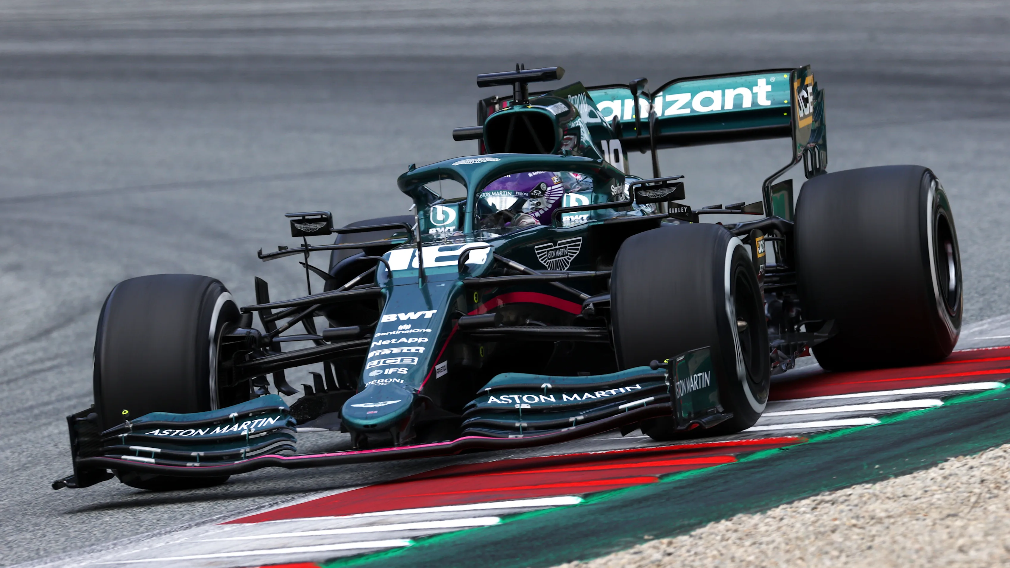 SPIELBERG, AUSTRIA - JULY 04: Lance Stroll of Canada driving the (18) Aston Martin AMR21 Mercedes during the F1 Grand Prix of Austria at Red Bull Ring on July 04, 2021 in Spielberg, Austria. (Photo by Clive Mason - Formula 1/Formula 1 via Getty Images)
