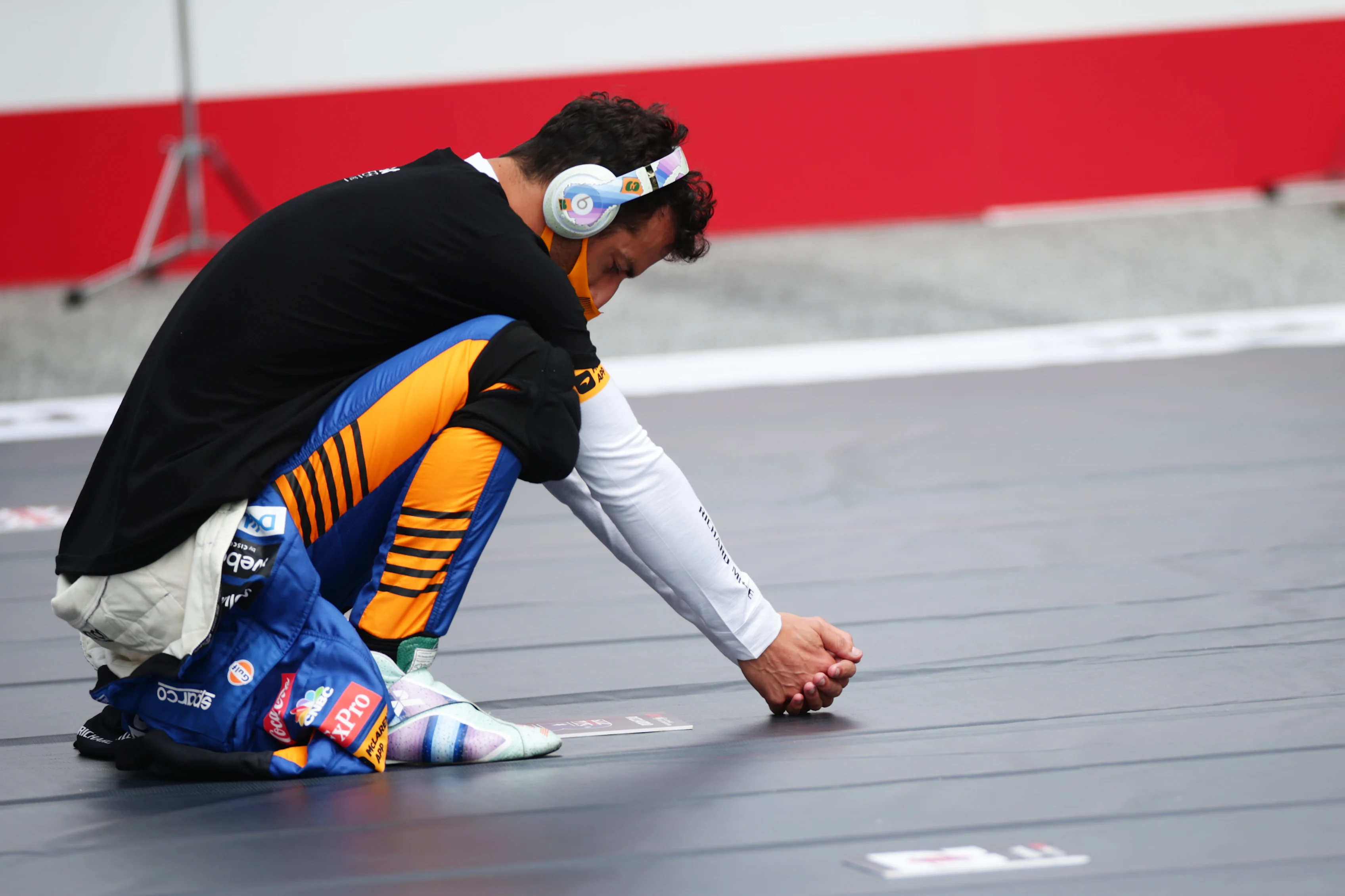 SPIELBERG, AUSTRIA - JULY 04: Daniel Ricciardo of Australia and McLaren F1 prepares to drive on the grid before the F1 Grand Prix of Austria at Red Bull Ring on July 04, 2021 in Spielberg, Austria. (Photo by Peter Fox/Getty Images)