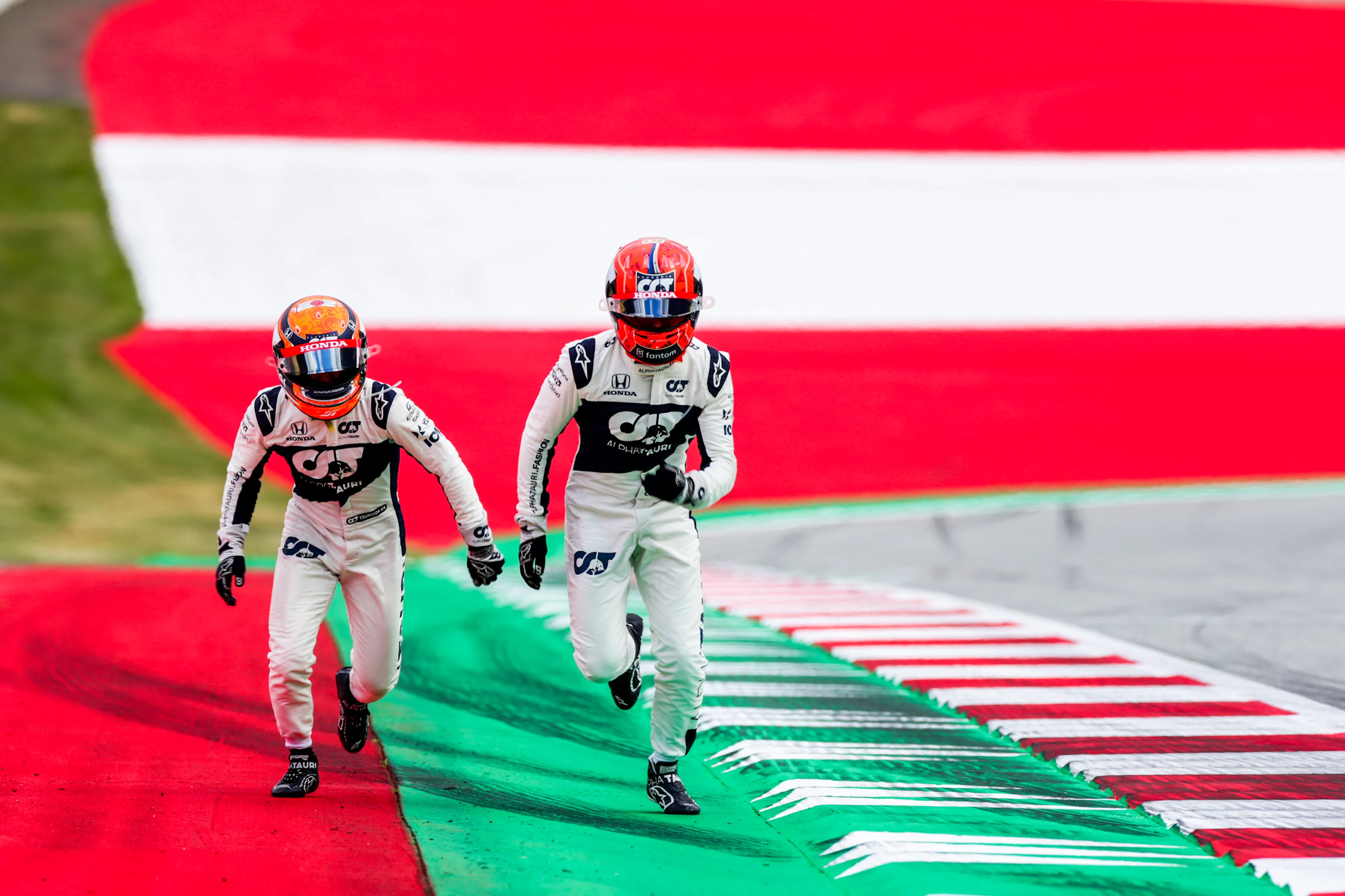 SPIELBERG, AUSTRIA - JULY 01: Pierre Gasly of Scuderia AlphaTauri and France with Yuki Tsunoda of