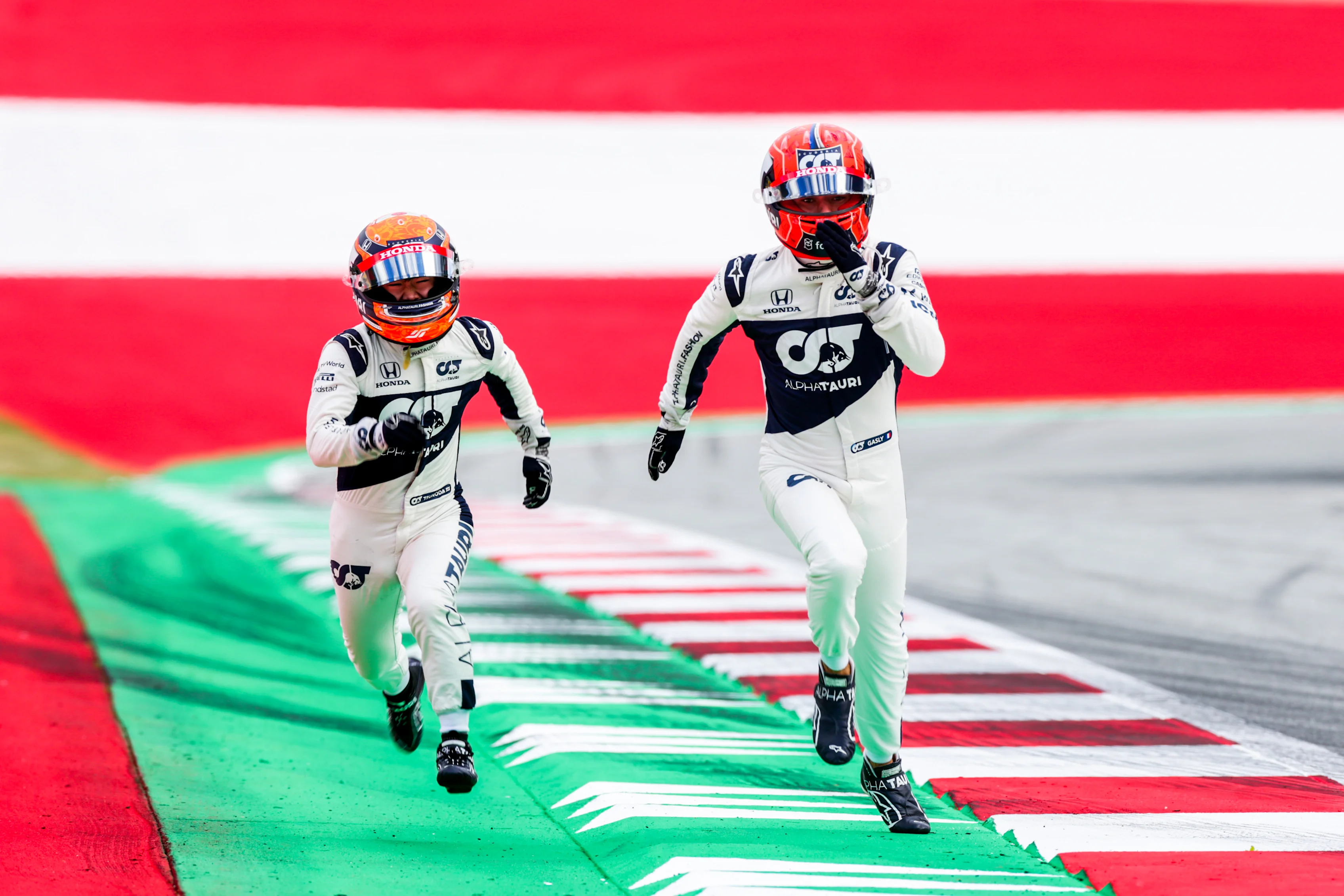 SPIELBERG, AUSTRIA - JULY 01: Pierre Gasly of Scuderia AlphaTauri and France with Yuki Tsunoda of