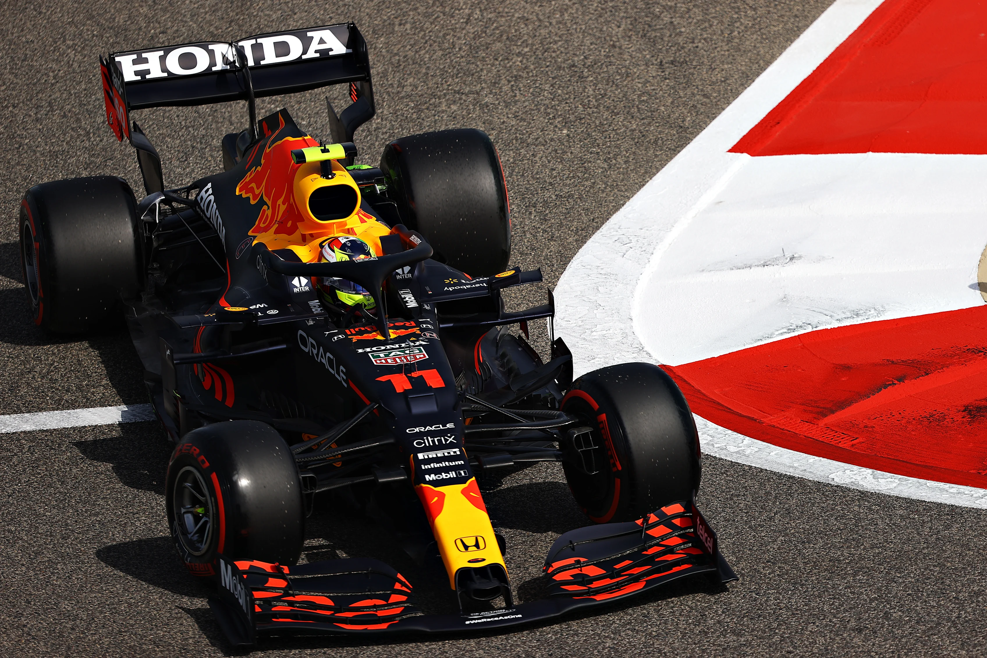 BAHRAIN, BAHRAIN - MARCH 26: Sergio Perez of Mexico driving the (11) Red Bull Racing RB16B Honda
