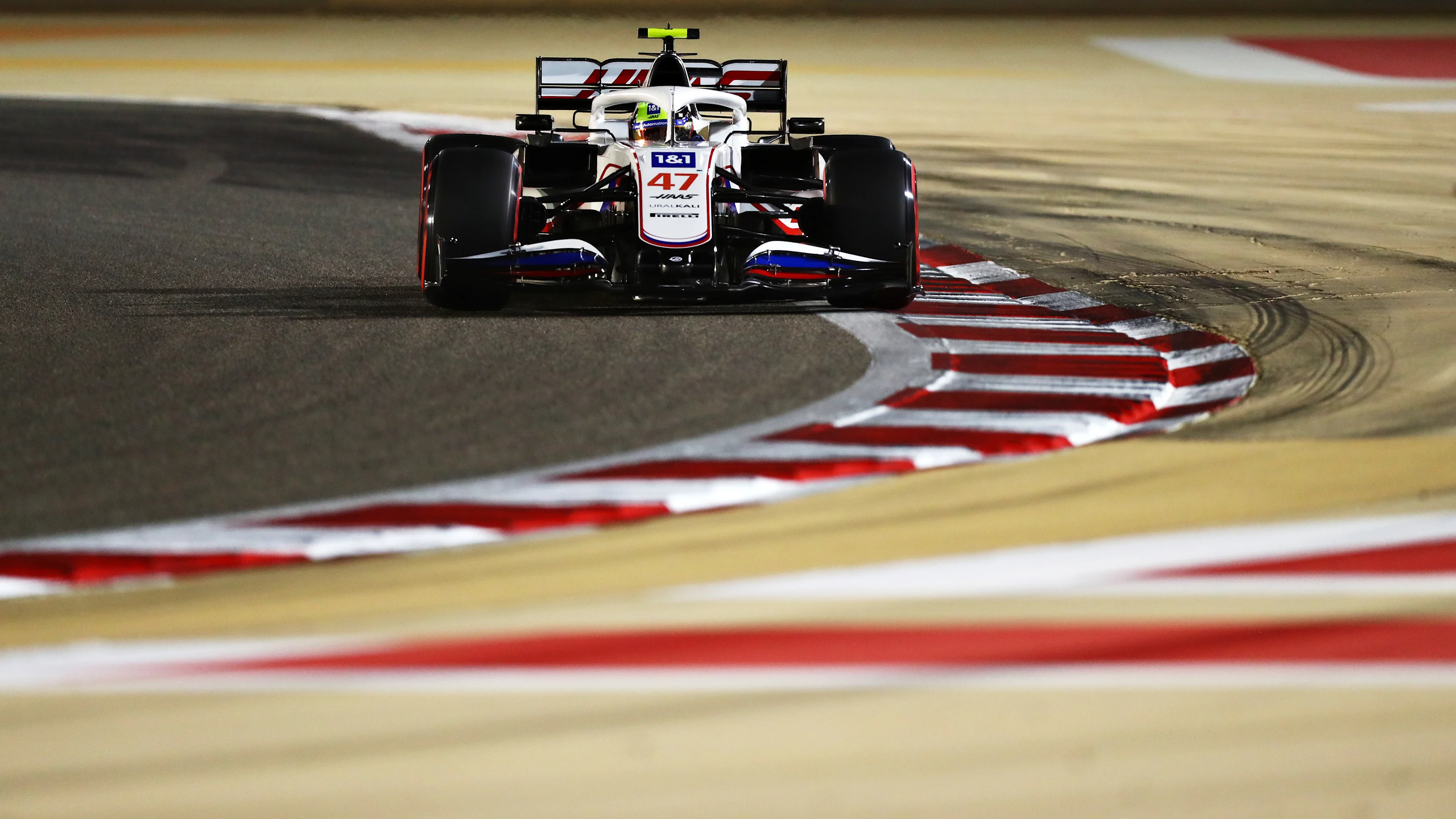 BAHRAIN, BAHRAIN - MARCH 27: Mick Schumacher of Germany driving the (47) Haas F1 Team VF-21 Ferrari during qualifying ahead of the F1 Grand Prix of Bahrain at Bahrain International Circuit on March 27, 2021 in Bahrain, Bahrain. (Photo by Dan Istitene - Formula 1/Formula 1 via Getty Images)