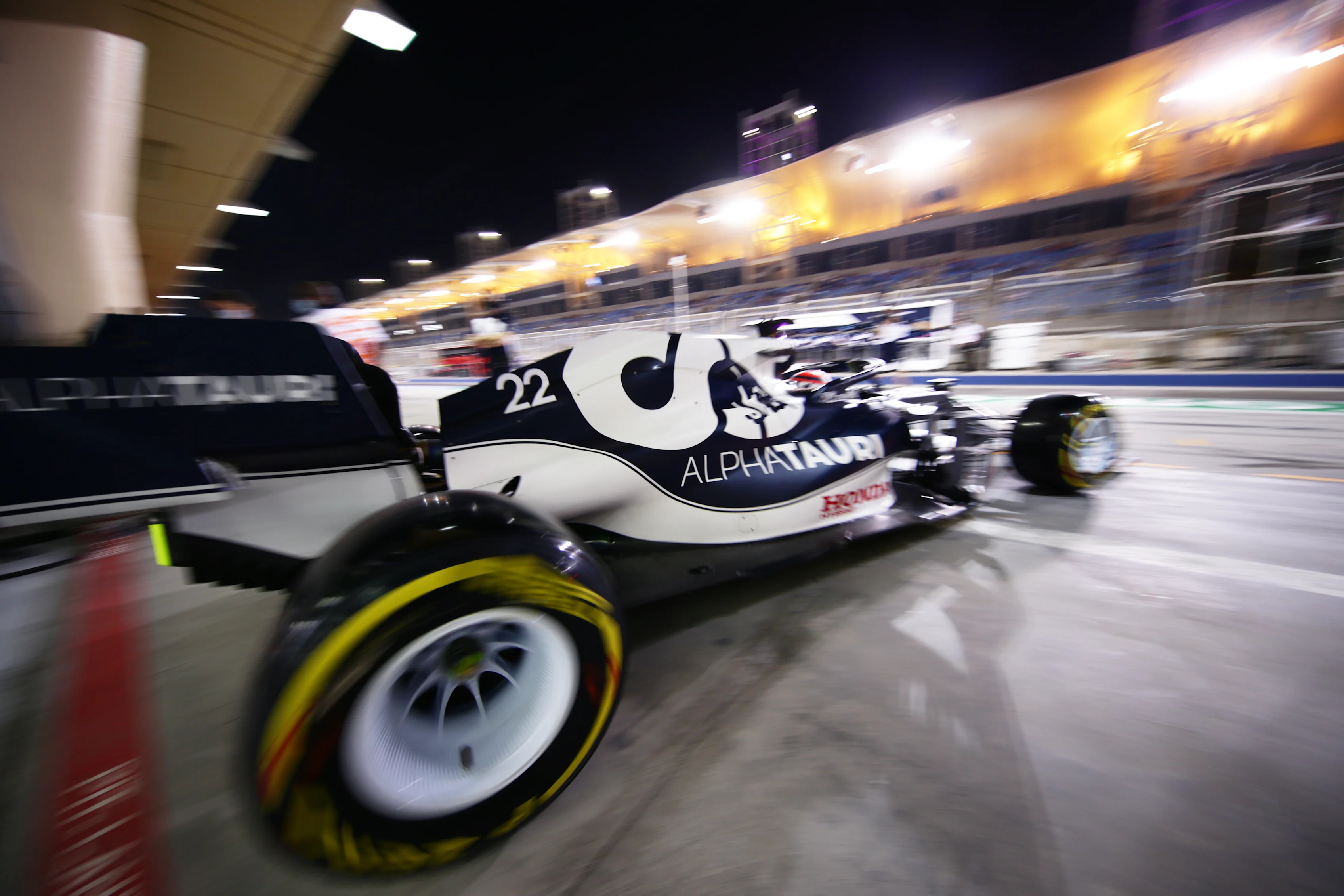 BAHRAIN, BAHRAIN - MARCH 27: Yuki Tsunoda of Japan driving the (22) Scuderia AlphaTauri AT02 Honda leaves the garage during qualifying ahead of the F1 Grand Prix of Bahrain at Bahrain International Circuit on March 27, 2021 in Bahrain, Bahrain. (Photo by Peter Fox/Getty Images)