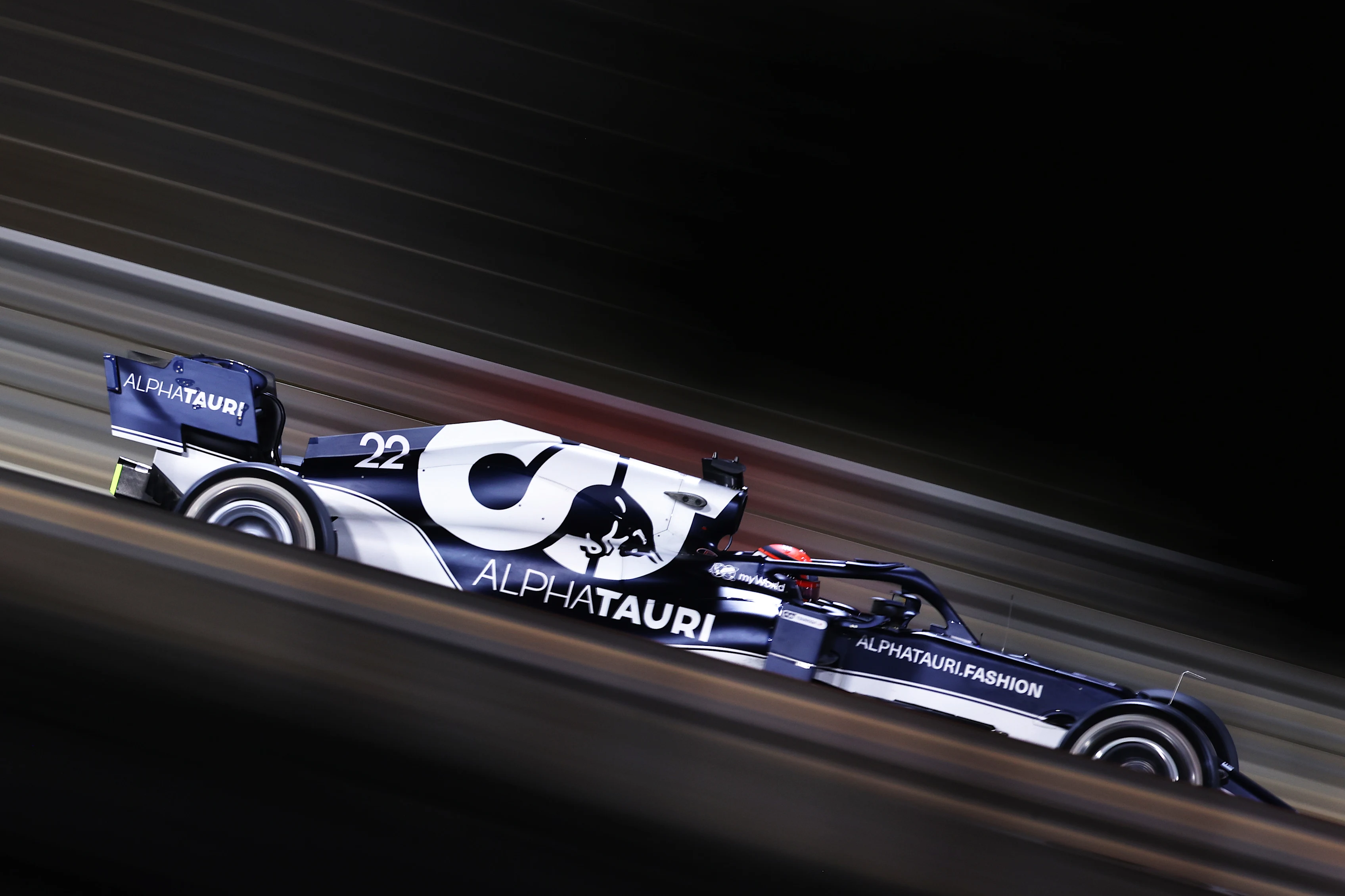 BAHRAIN, BAHRAIN - MARCH 28: Yuki Tsunoda of Japan driving the (22) Scuderia AlphaTauri AT02 Honda