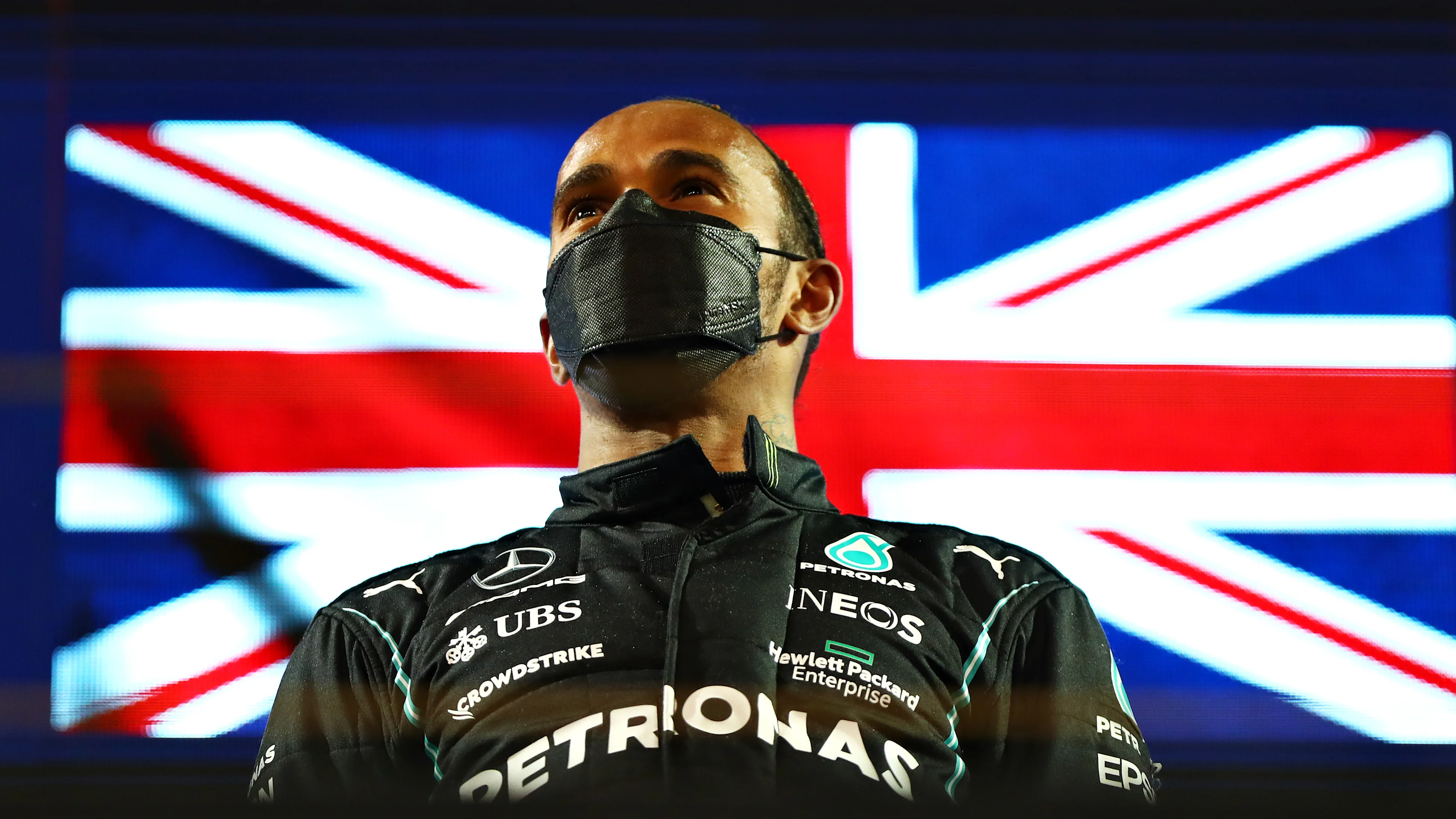 BAHRAIN, BAHRAIN - MARCH 28: Race winner Lewis Hamilton of Great Britain and Mercedes GP celebrates
