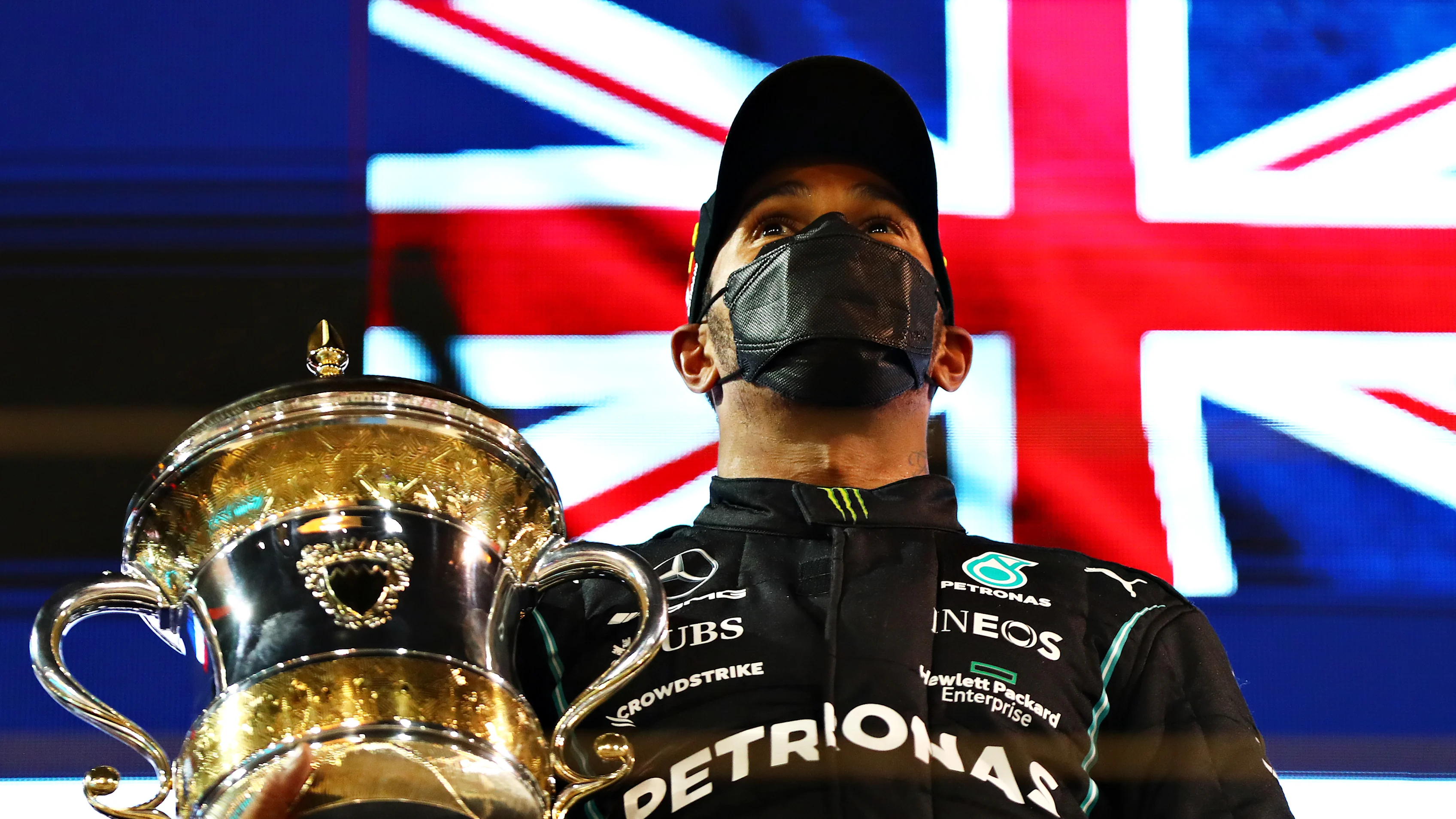 BAHRAIN, BAHRAIN - MARCH 28: Race winner Lewis Hamilton of Great Britain and Mercedes GP celebrates