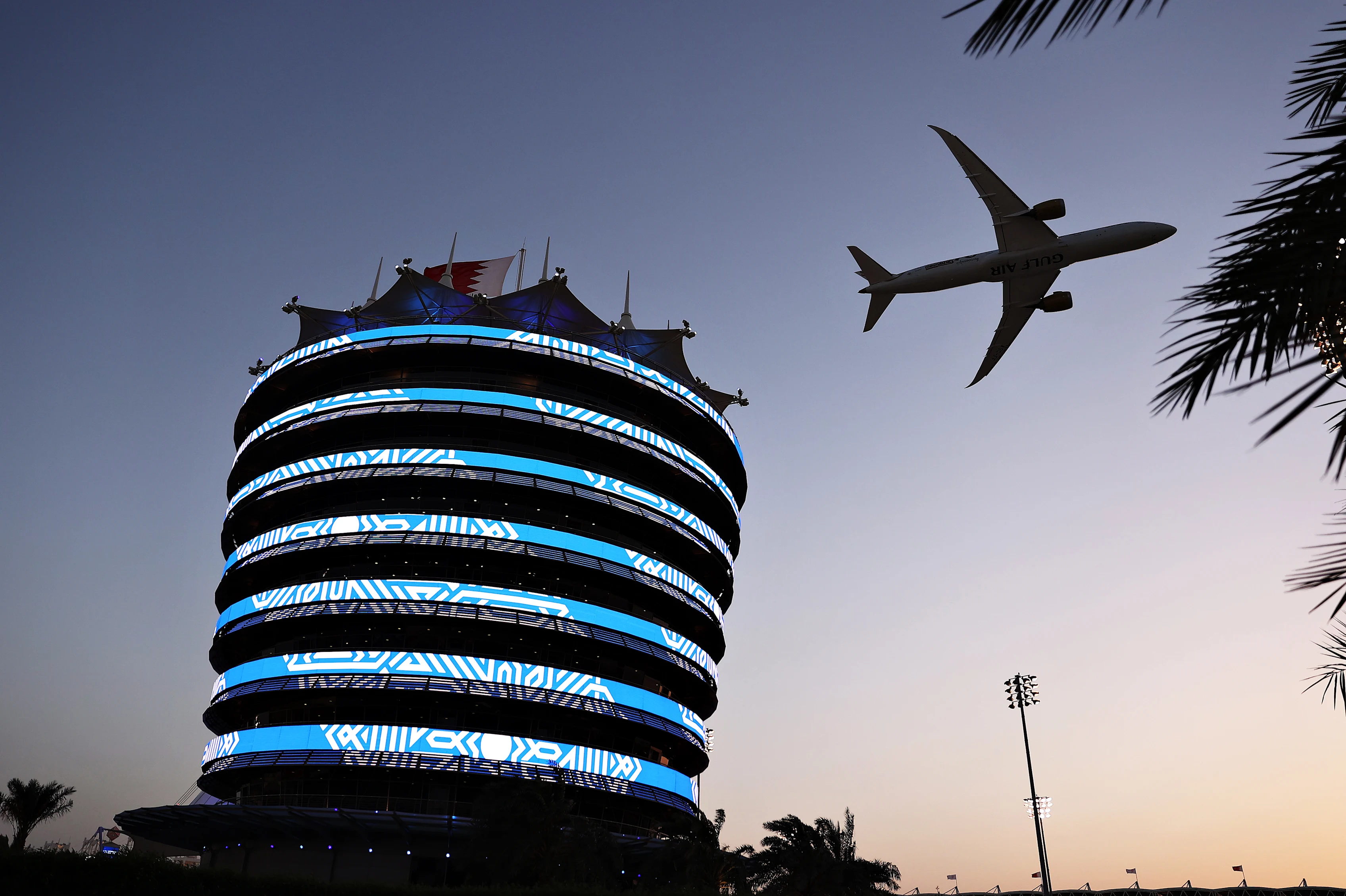 BAHRAIN, BAHRAIN - MARCH 28: A Gulf Air plane flies over the grid prior to the F1 Grand Prix of