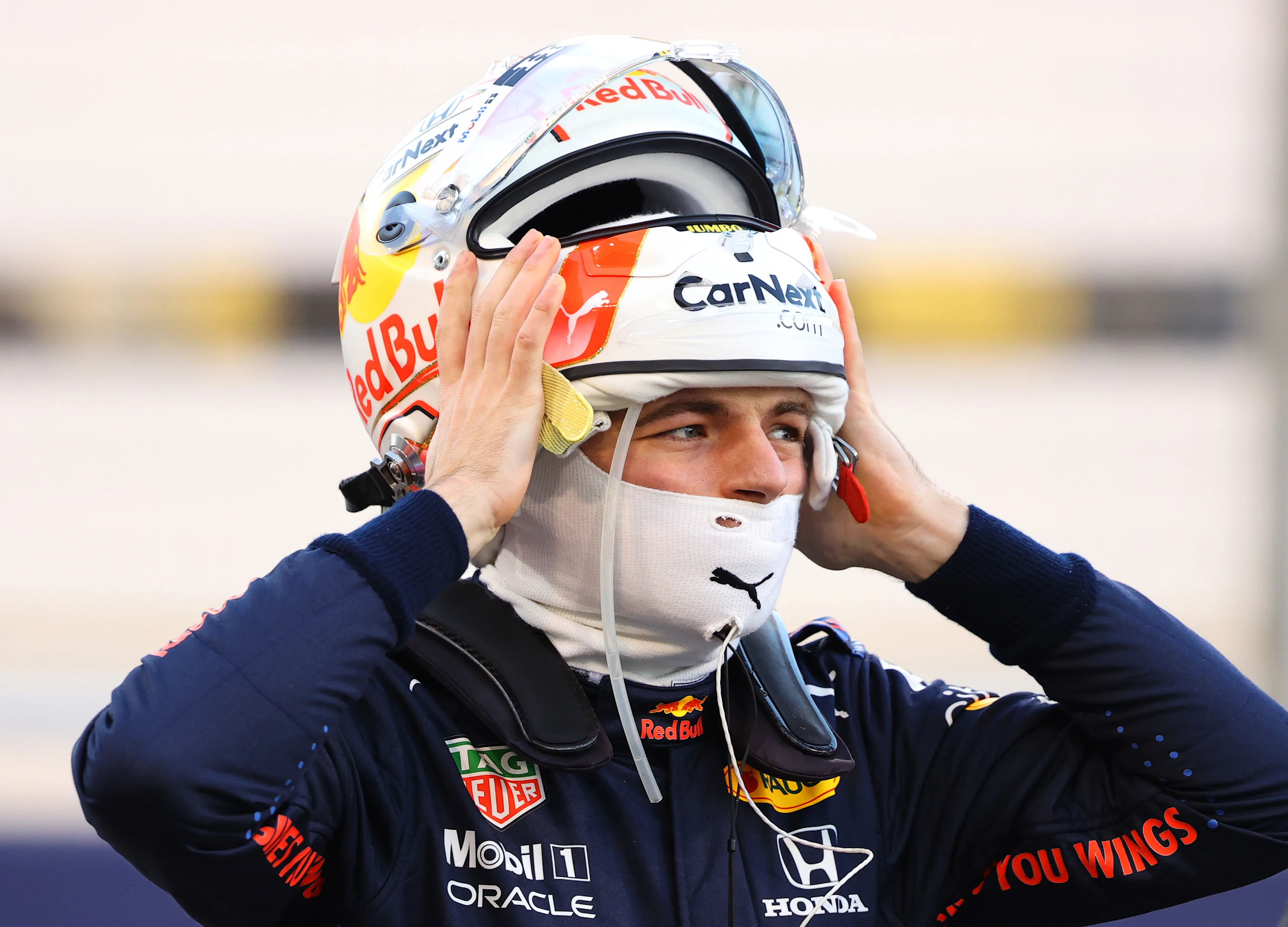 BAHRAIN, BAHRAIN - MARCH 28: Max Verstappen of Netherlands and Red Bull Racing puts his helmet on
