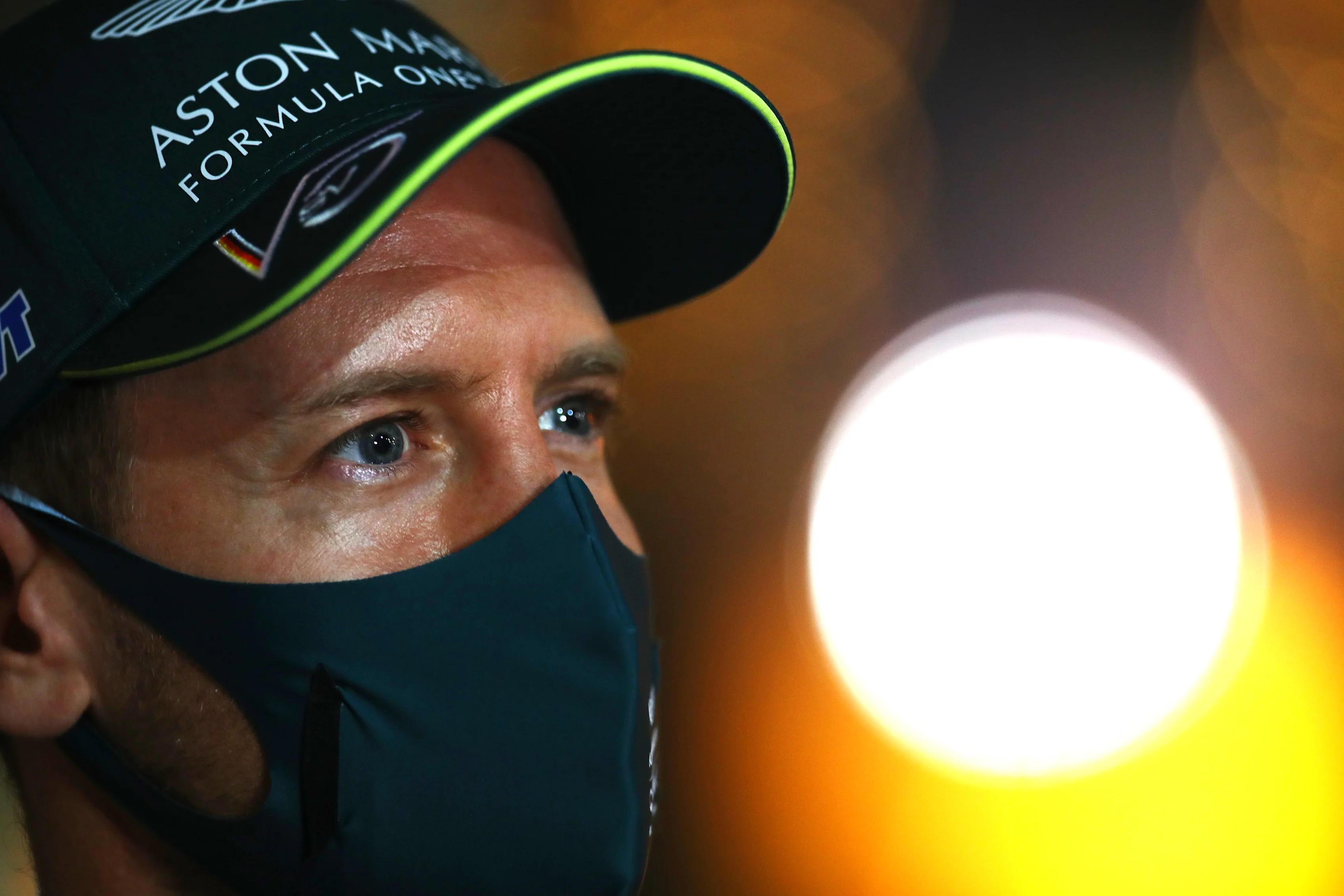 BAHRAIN, BAHRAIN - MARCH 25: Sebastian Vettel of Germany and Aston Martin F1 Team talks to the