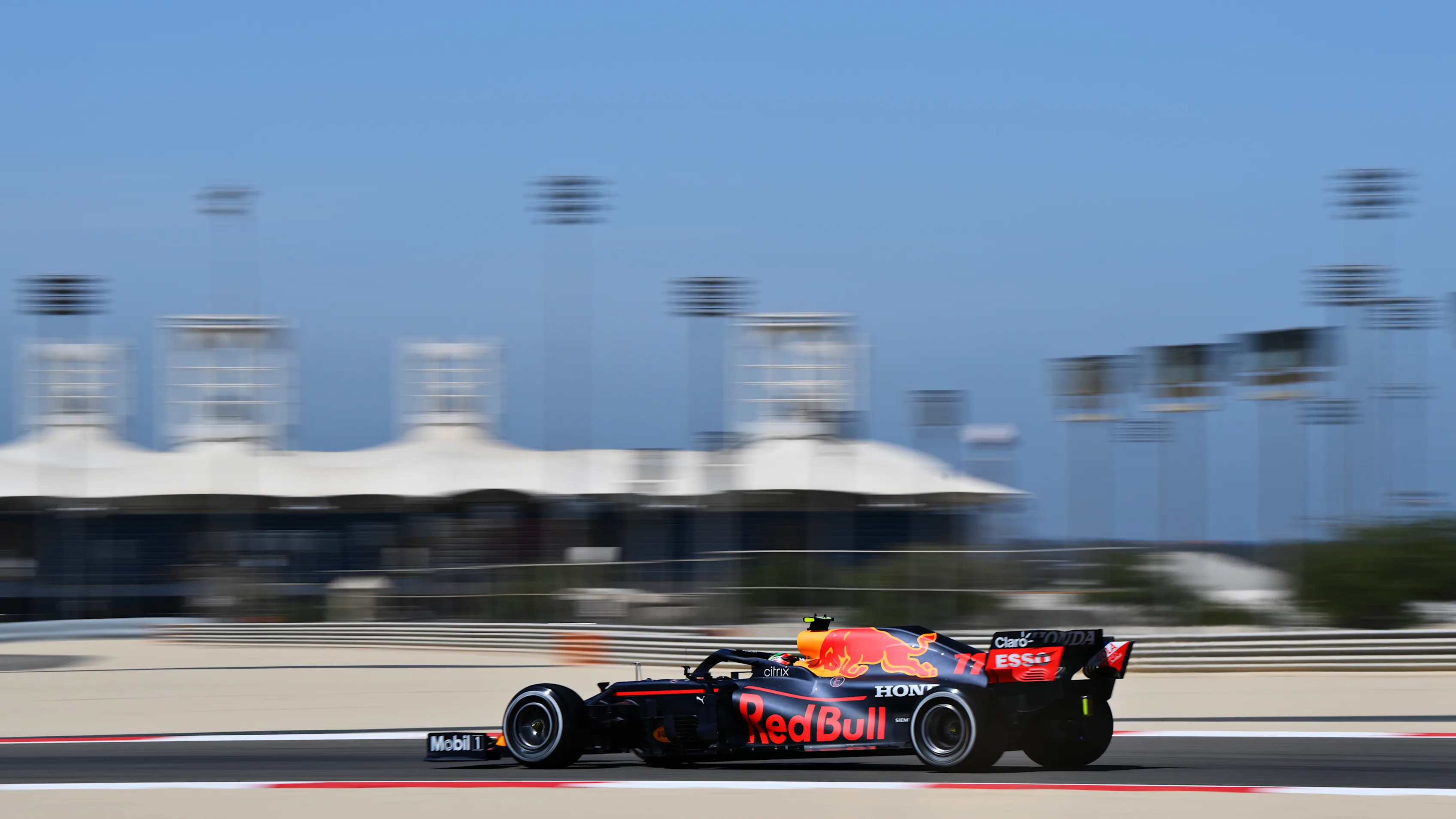 BAHRAIN, BAHRAIN - MARCH 14: Sergio Perez of Mexico driving the (11) Red Bull Racing RB16B Honda