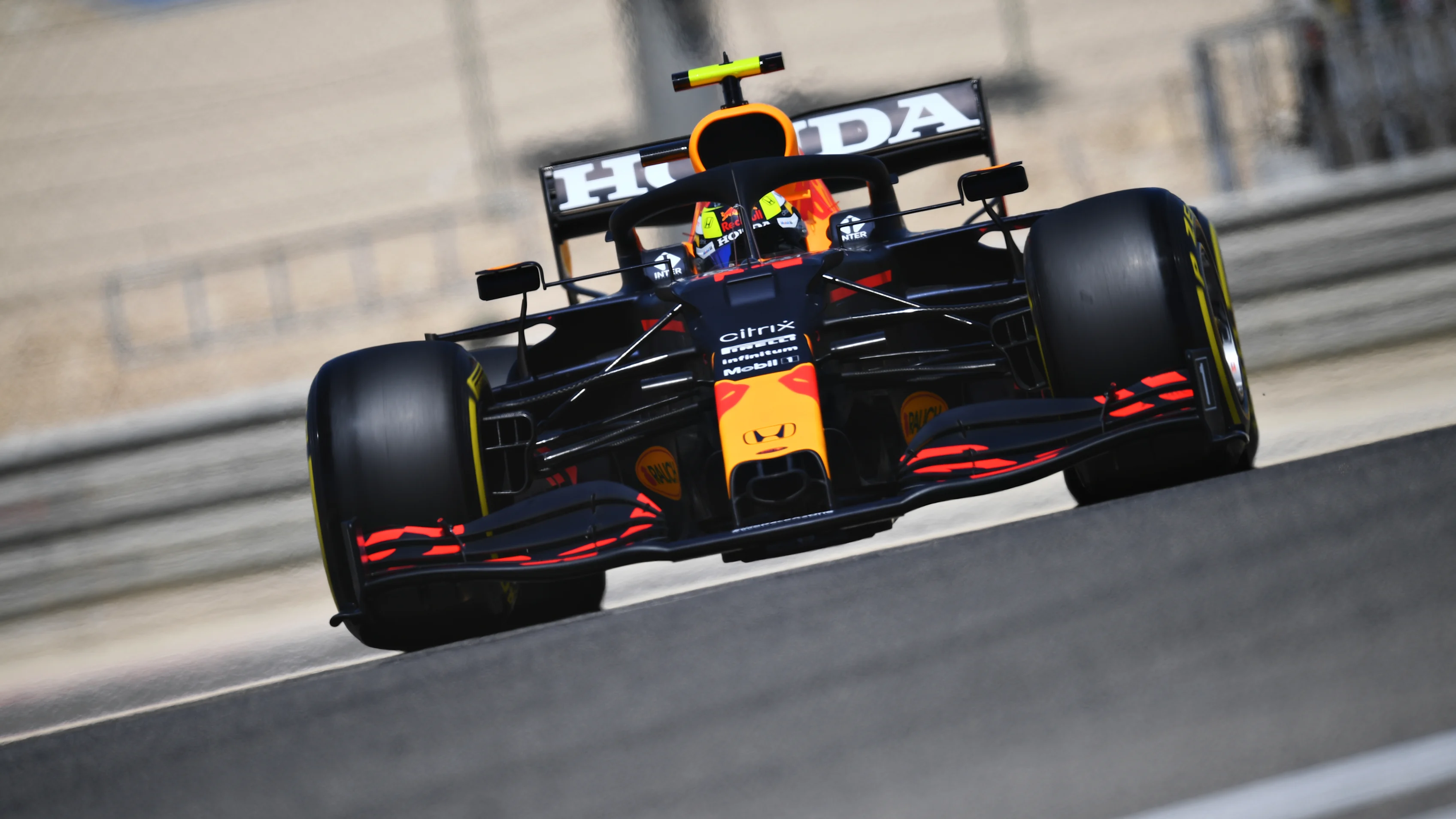 BAHRAIN, BAHRAIN - MARCH 14: Sergio Perez of Mexico driving the (11) Red Bull Racing RB16B Honda