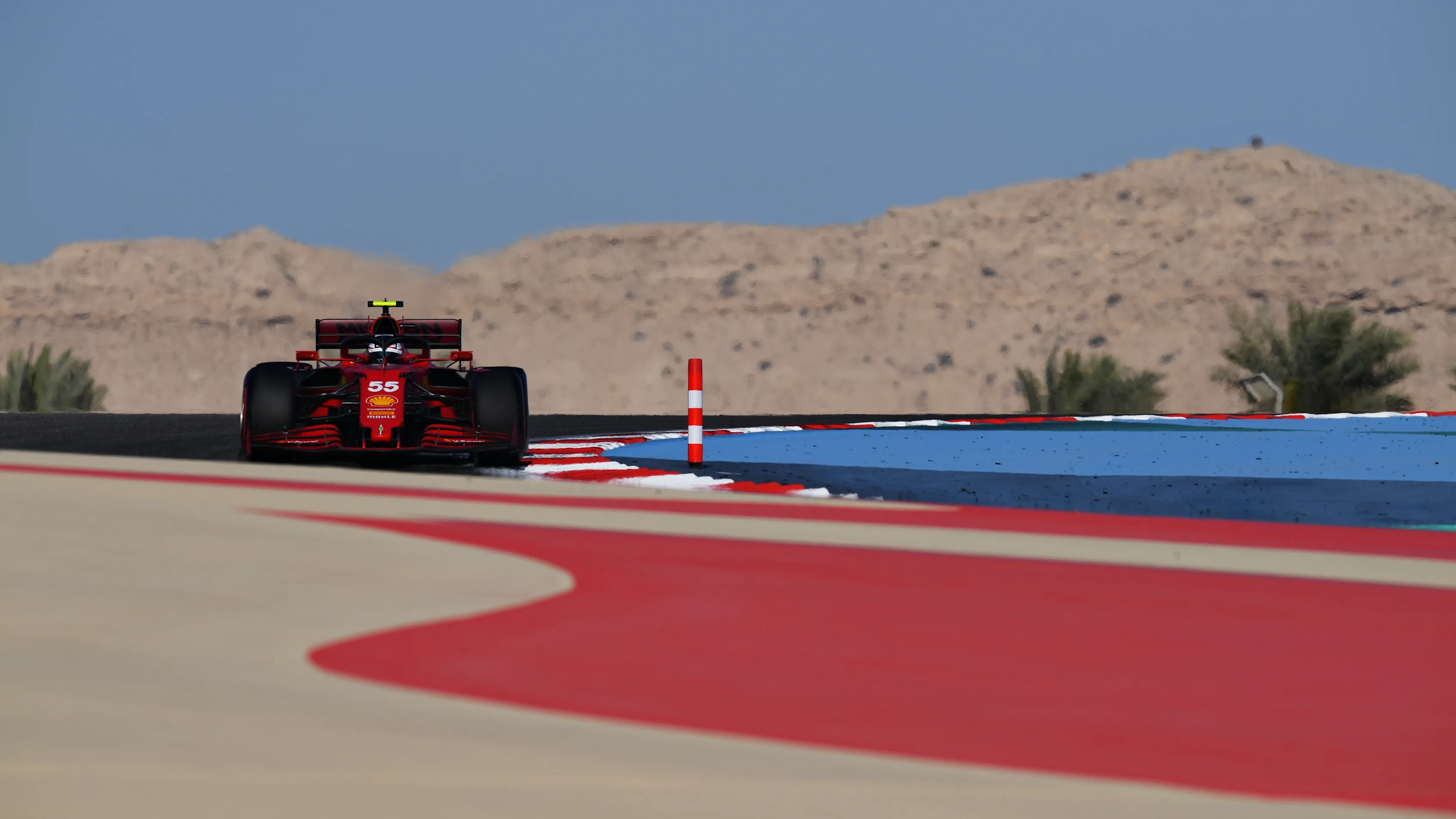 BAHRAIN, BAHRAIN - MARCH 14: Carlos Sainz of Spain driving the (55) Scuderia Ferrari SF21 during