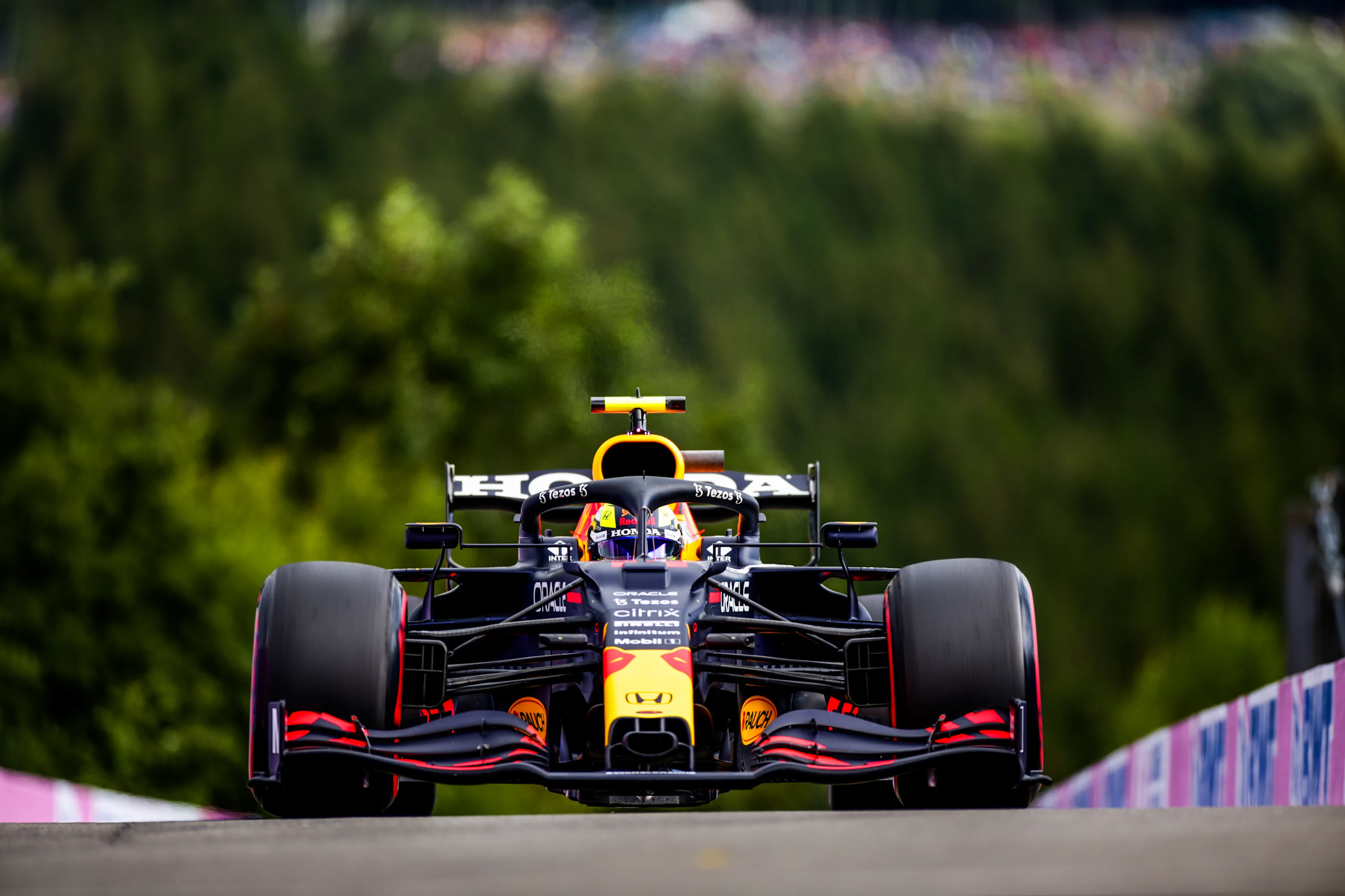 SPA, BELGIUM - AUGUST 27: Sergio Perez of Mexico and Red Bull Racing during practice ahead of the