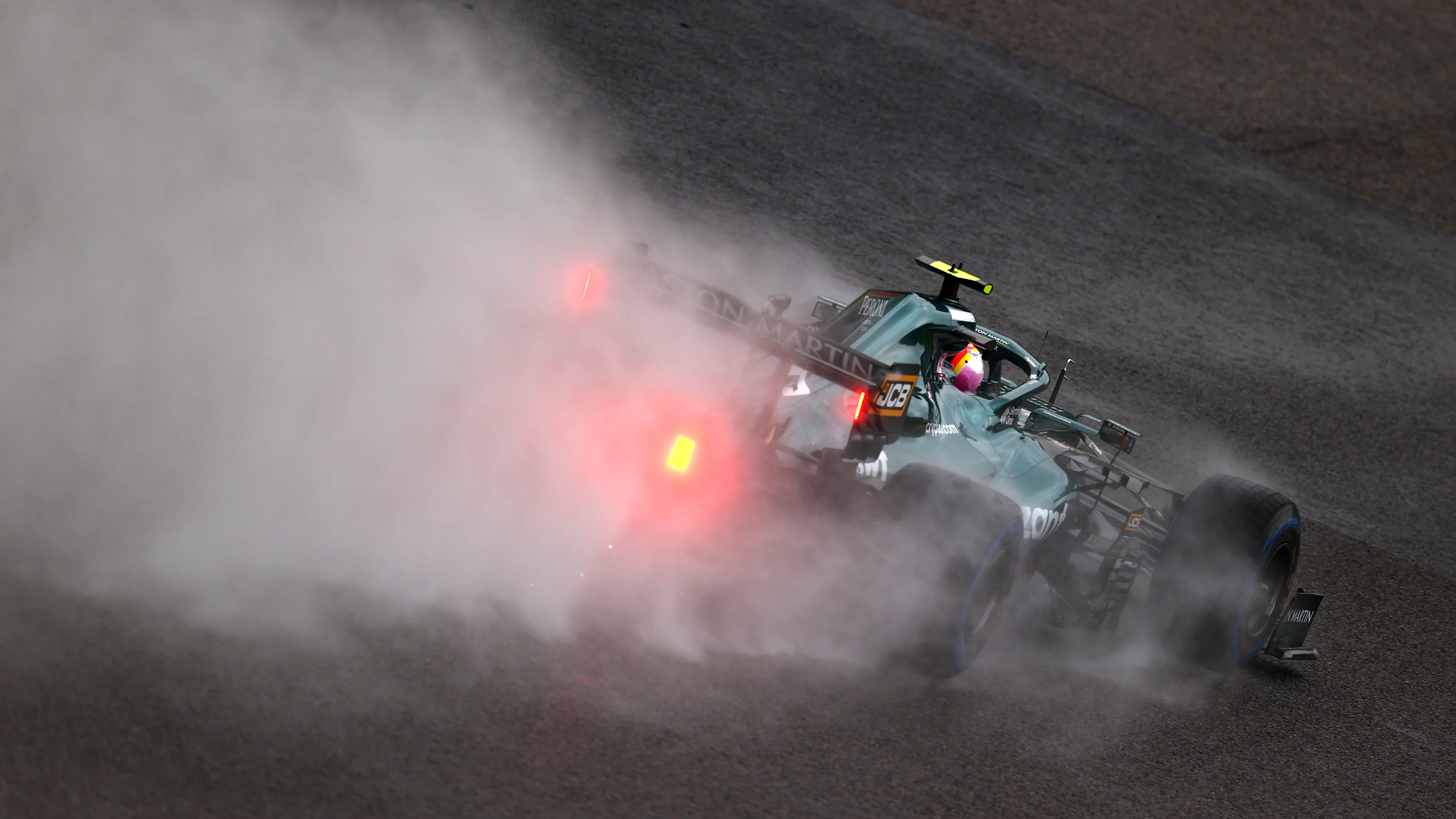 SPA, BELGIUM - AUGUST 28: Sebastian Vettel of Germany driving the (5) Aston Martin AMR21 Mercedes during qualifying ahead of the F1 Grand Prix of Belgium at Circuit de Spa-Francorchamps on August 28, 2021 in Spa, Belgium. (Photo by Dan Istitene - Formula 1/Formula 1 via Getty Images)