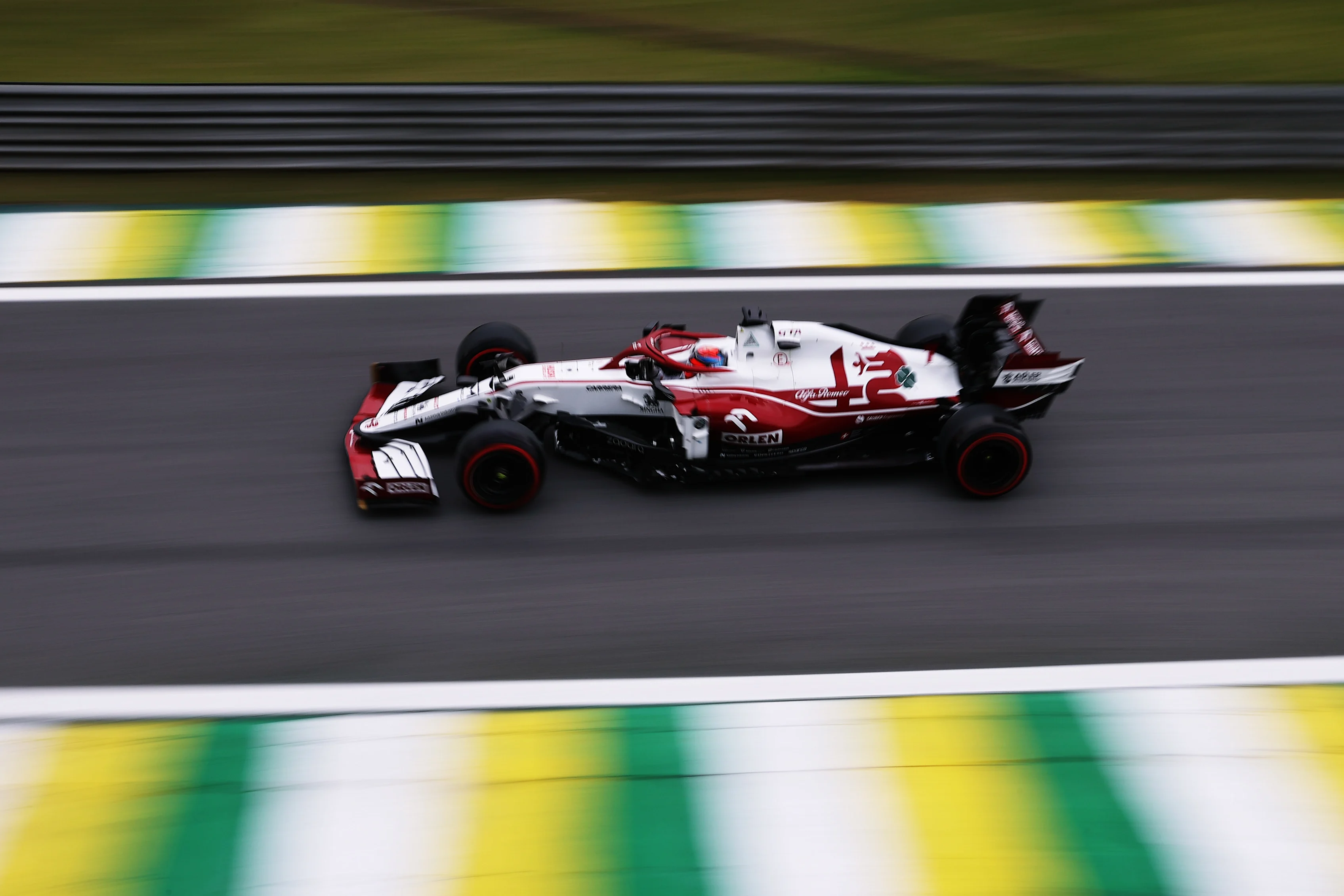 SAO PAULO, BRAZIL - NOVEMBER 12: Kimi Raikkonen of Finland driving the (7) Alfa Romeo Racing C41 Ferrari during qualifying ahead of the F1 Grand Prix of Brazil at Autodromo Jose Carlos Pace on November 12, 2021 in Sao Paulo, Brazil. (Photo by Lars Baron/Getty Images)