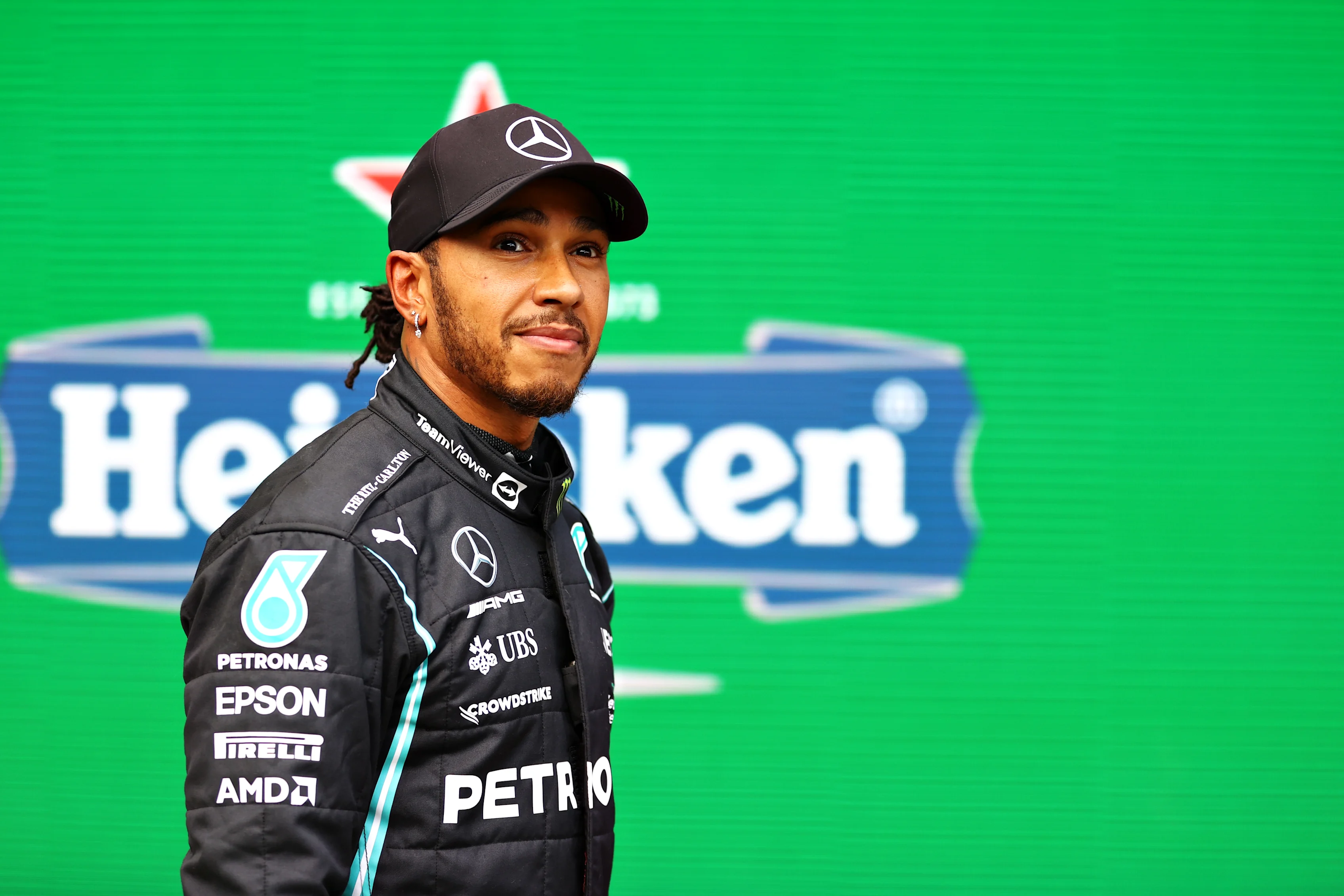 SAO PAULO, BRAZIL - NOVEMBER 12: Fastest qualifier Lewis Hamilton of Great Britain and Mercedes GP