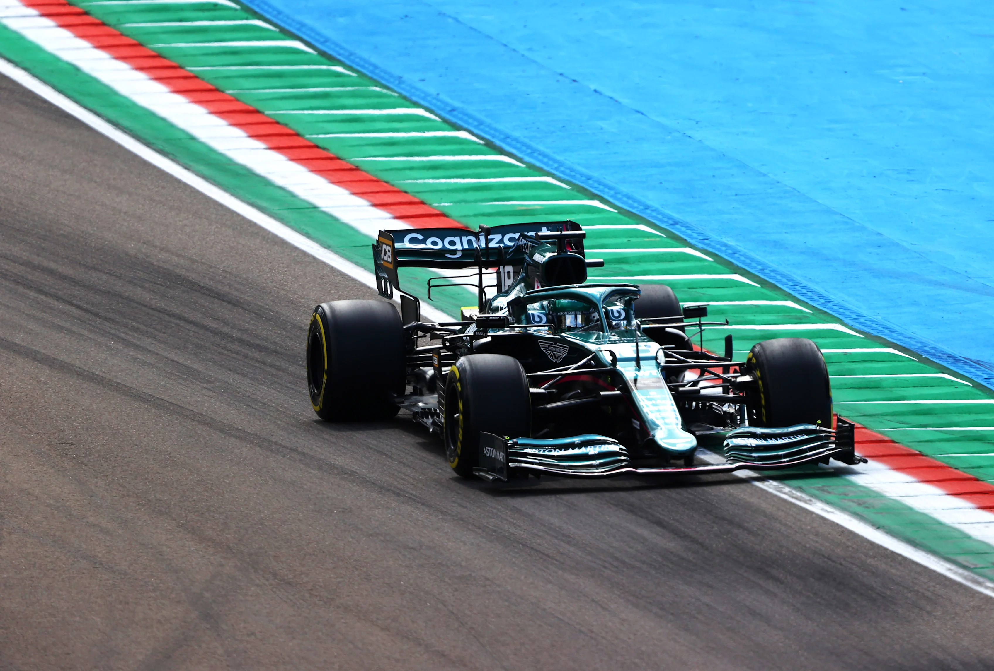 IMOLA, ITALY - APRIL 16: Lance Stroll of Canada driving the (18) Aston Martin AMR21 Mercedes on track during practice ahead of the F1 Grand Prix of Emilia Romagna at Autodromo Enzo e Dino Ferrari on April 16, 2021 in Imola, Italy. (Photo by Bryn Lennon/Getty Images)