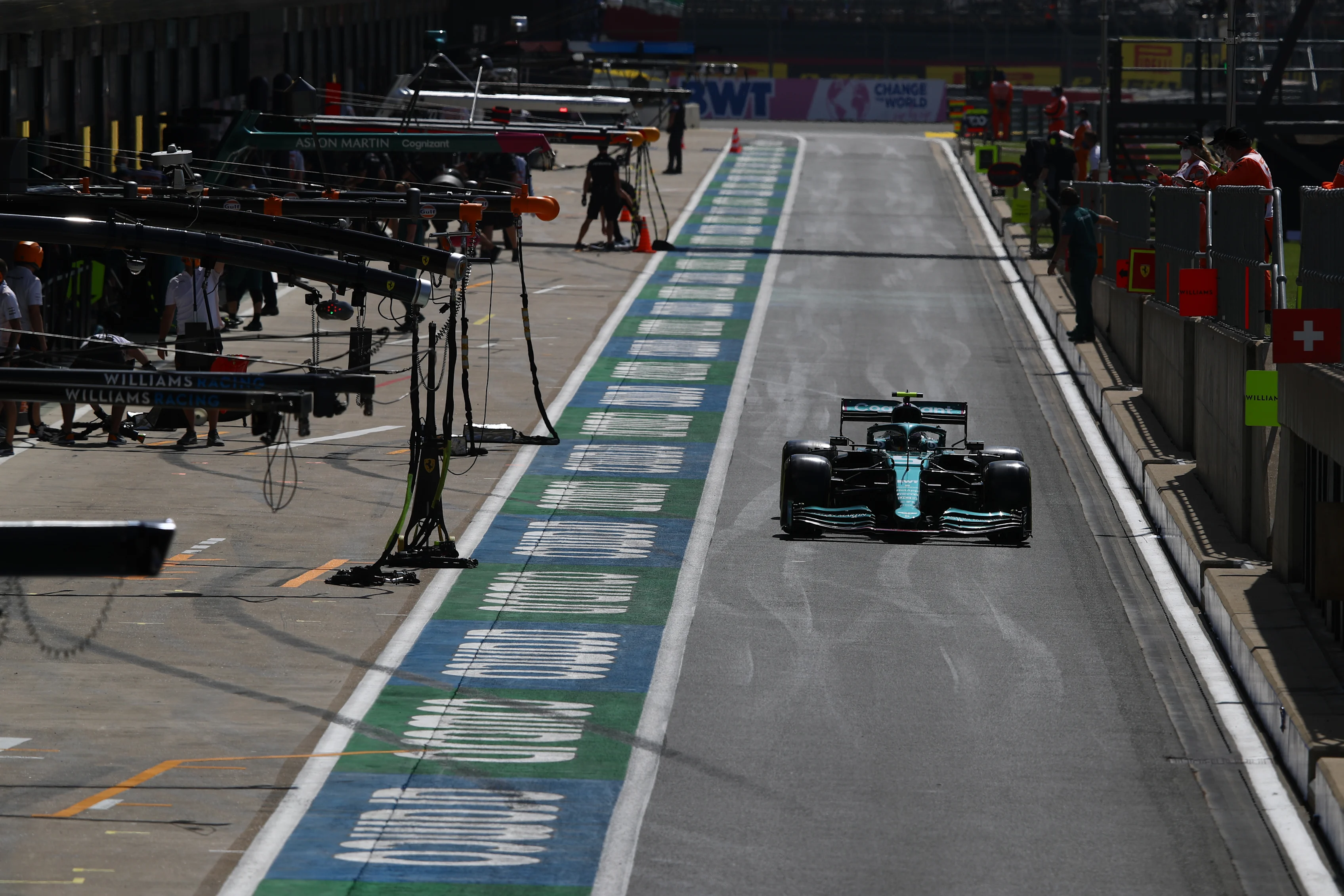 NORTHAMPTON, ENGLAND - JULY 16: Sebastian Vettel of Germany driving the (5) Aston Martin AMR21 Mercedes in the Pitlane during practice ahead of the F1 Grand Prix of Great Britain at Silverstone on July 16, 2021 in Northampton, England. (Photo by Mark Thompson/Getty Images)