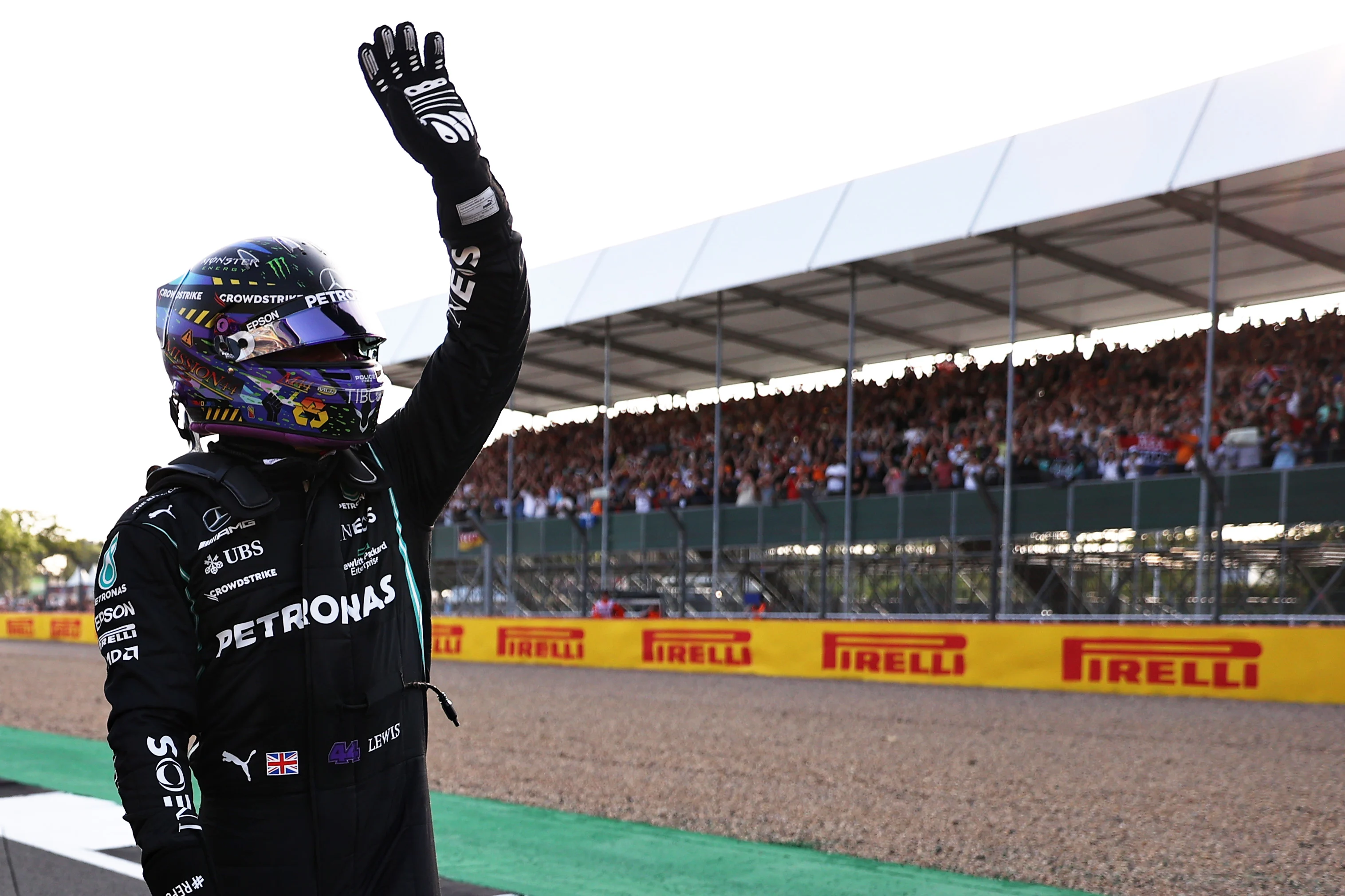 NORTHAMPTON, ENGLAND - JULY 16: Fastest qualifier Lewis Hamilton of Great Britain and Mercedes GP celebrates in parc ferme during qualifying ahead of the F1 Grand Prix of Great Britain at Silverstone on July 16, 2021 in Northampton, England. (Photo by Lars Baron/Getty Images)