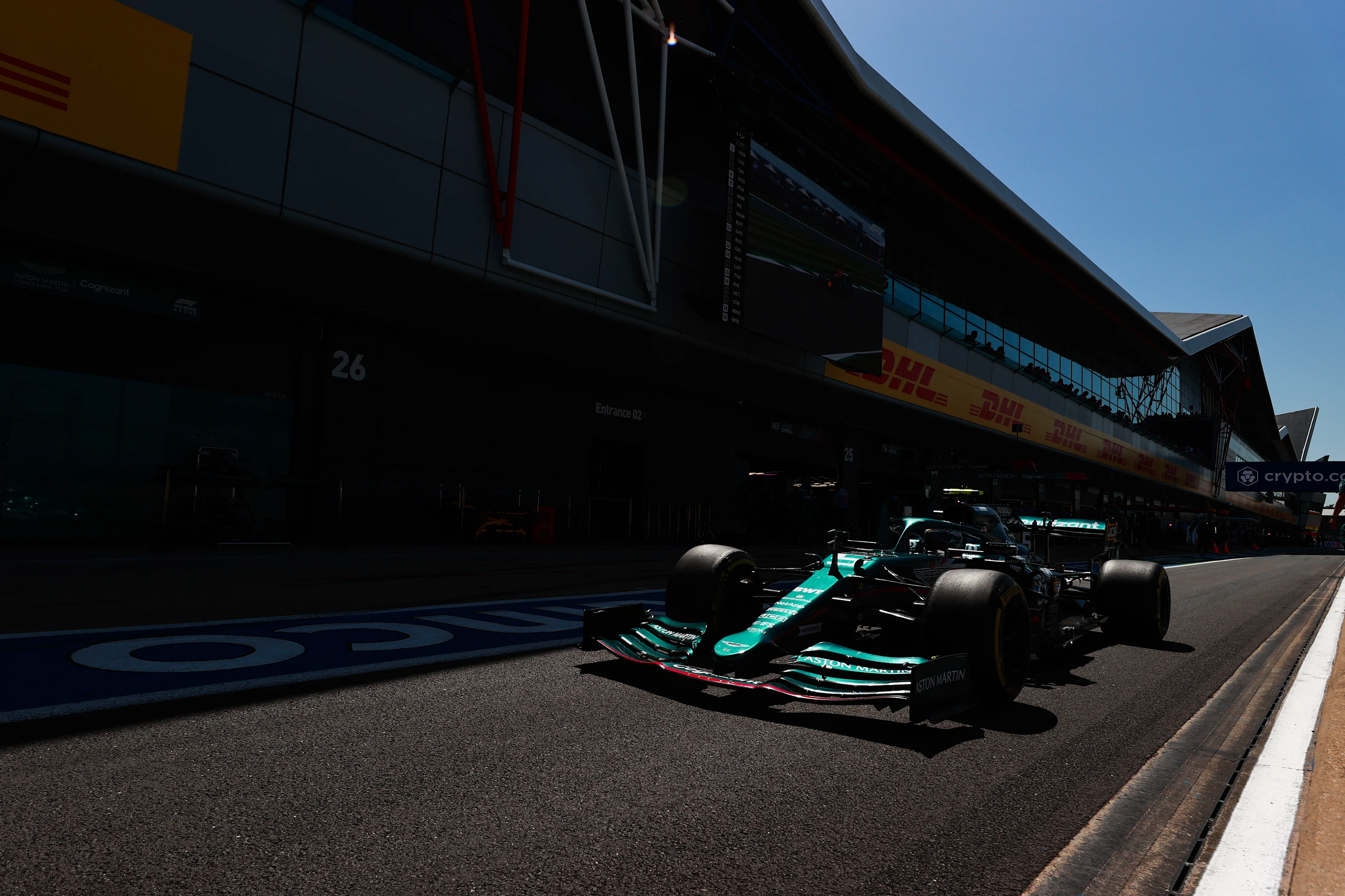 NORTHAMPTON, ENGLAND - JULY 17: Sebastian Vettel of Germany driving the (5) Aston Martin AMR21 Mercedes in the Pitlane during practice ahead of the F1 Grand Prix of Great Britain at Silverstone on July 17, 2021 in Northampton, England. (Photo by Mark Thompson/Getty Images)