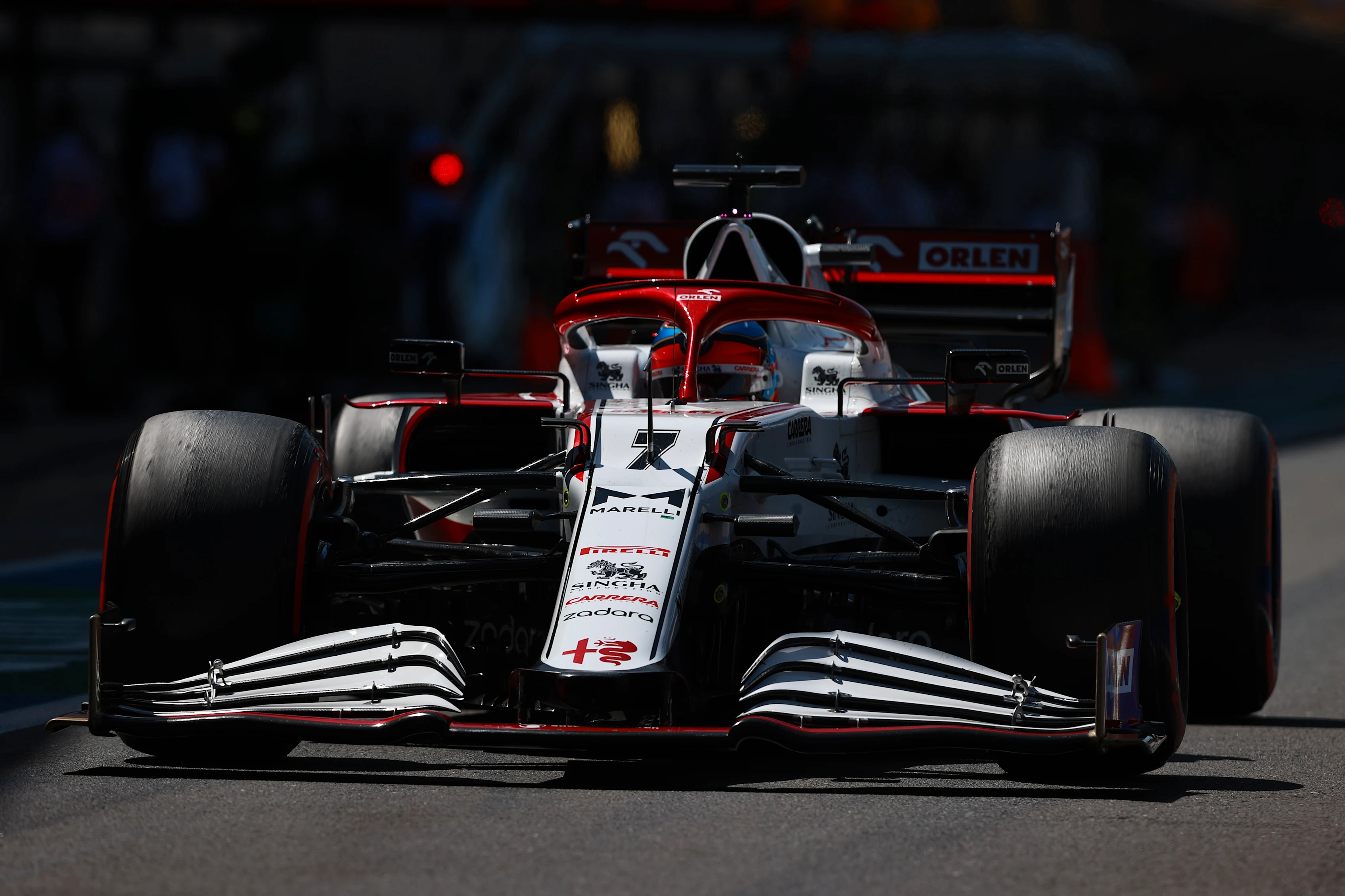 NORTHAMPTON, ENGLAND - JULY 17: Kimi Raikkonen of Finland driving the (7) Alfa Romeo Racing C41 Ferrari in the Pitlane during practice ahead of the F1 Grand Prix of Great Britain at Silverstone on July 17, 2021 in Northampton, England. (Photo by Mark Thompson/Getty Images)
