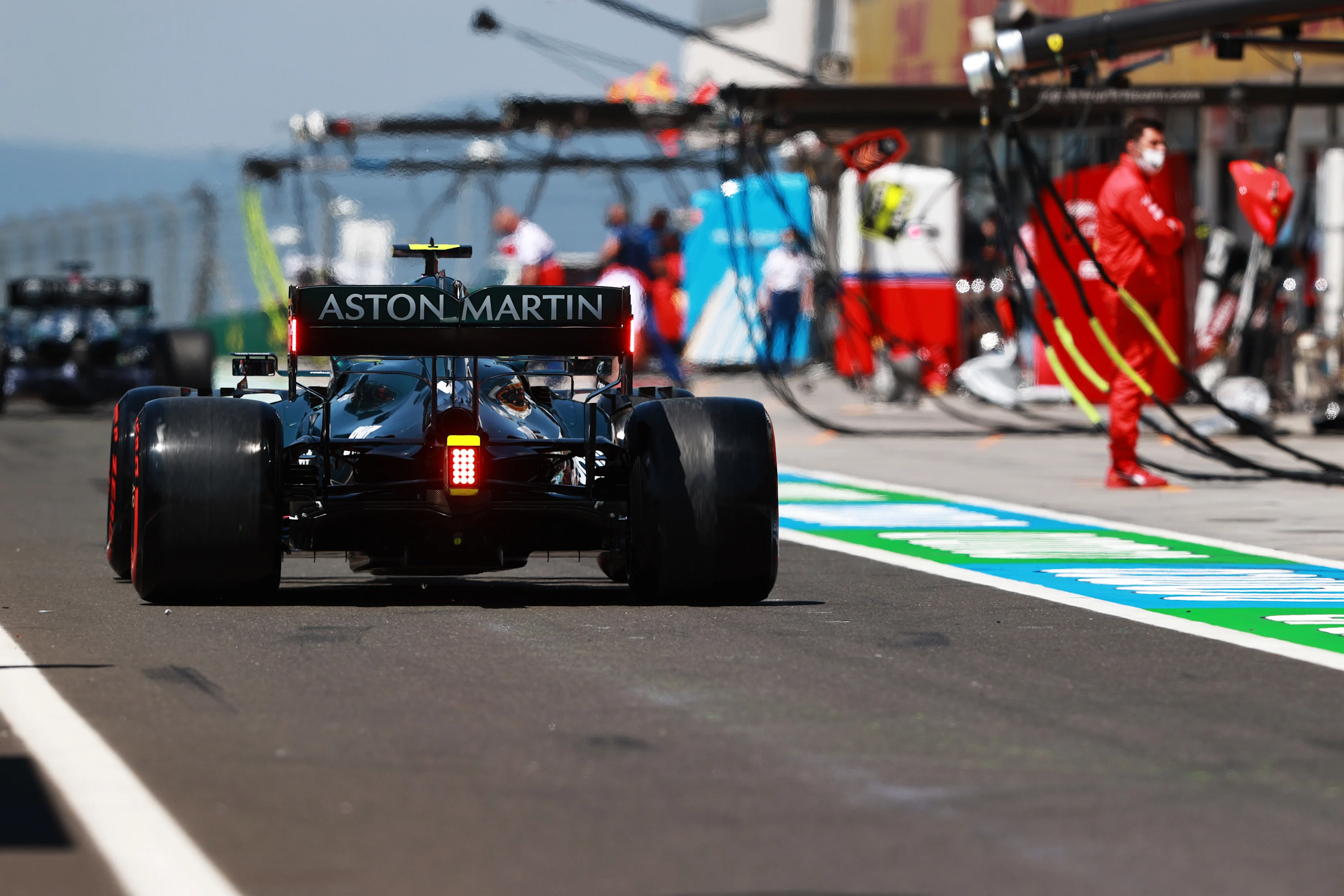 BUDAPEST, HUNGARY - JULY 30: Sebastian Vettel of Germany driving the (5) Aston Martin AMR21 Mercedes in the Pitlane during practice ahead of the F1 Grand Prix of Hungary at Hungaroring on July 30, 2021 in Budapest, Hungary. (Photo by Mark Thompson/Getty Images)