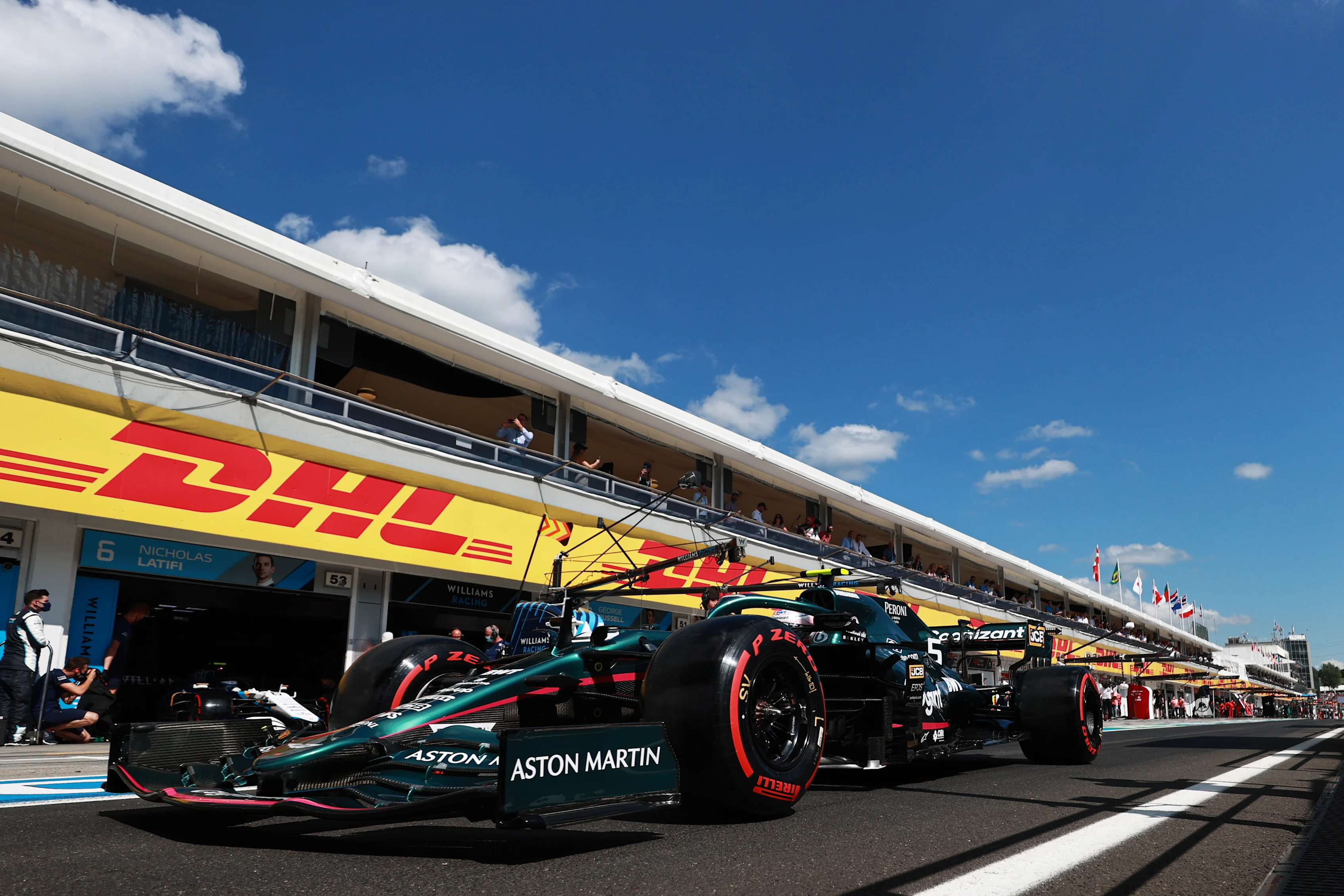 BUDAPEST, HUNGARY - JULY 31: Sebastian Vettel of Germany driving the (5) Aston Martin AMR21