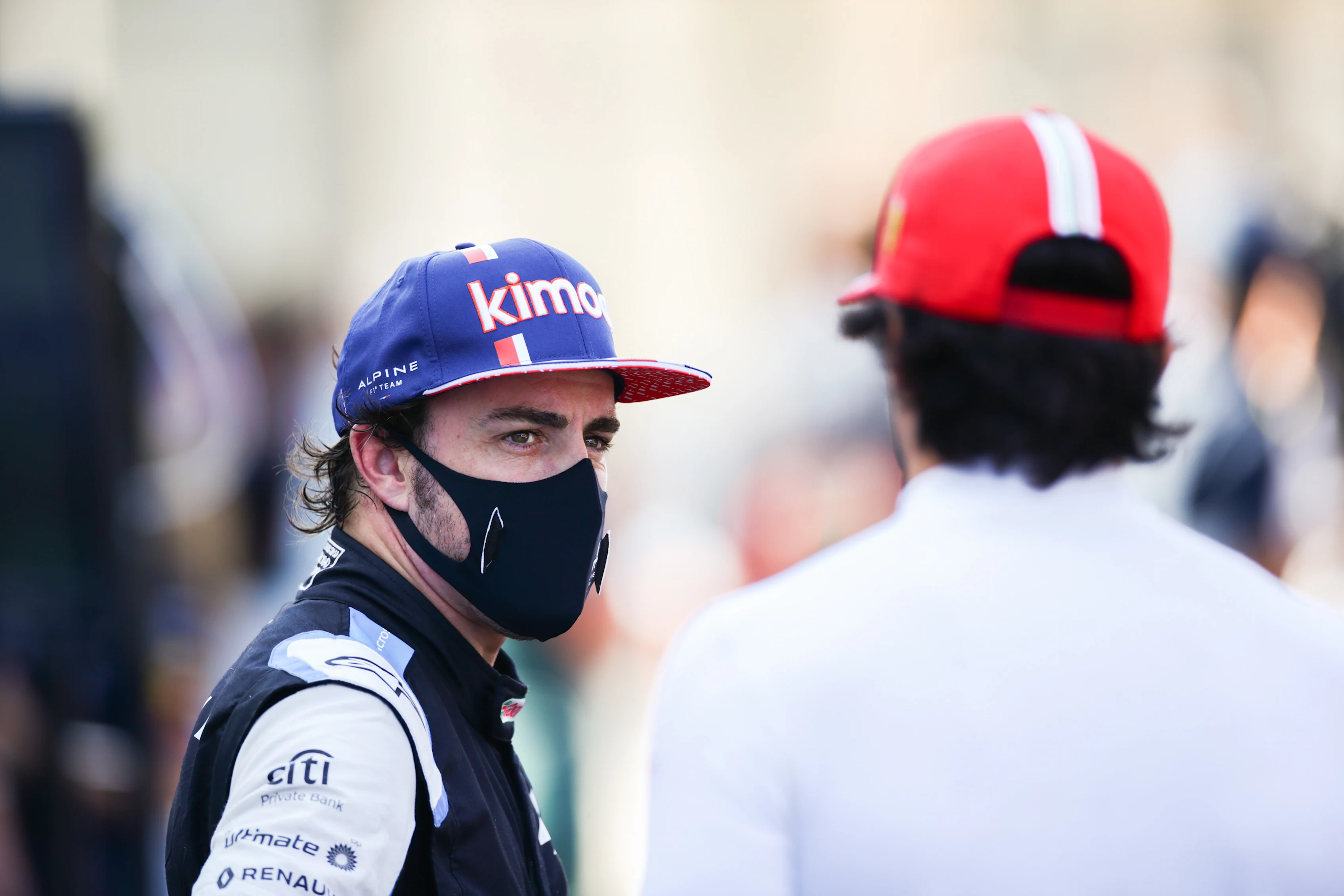BUDAPEST, HUNGARY - JULY 31: Fernando Alonso of Alpine F1 and Spain chats with Carlos Sainz of Ferrari and Spain  during qualifying ahead of the F1 Grand Prix of Hungary at Hungaroring on July 31, 2021 in Budapest, Hungary. (Photo by Peter Fox/Getty Images)