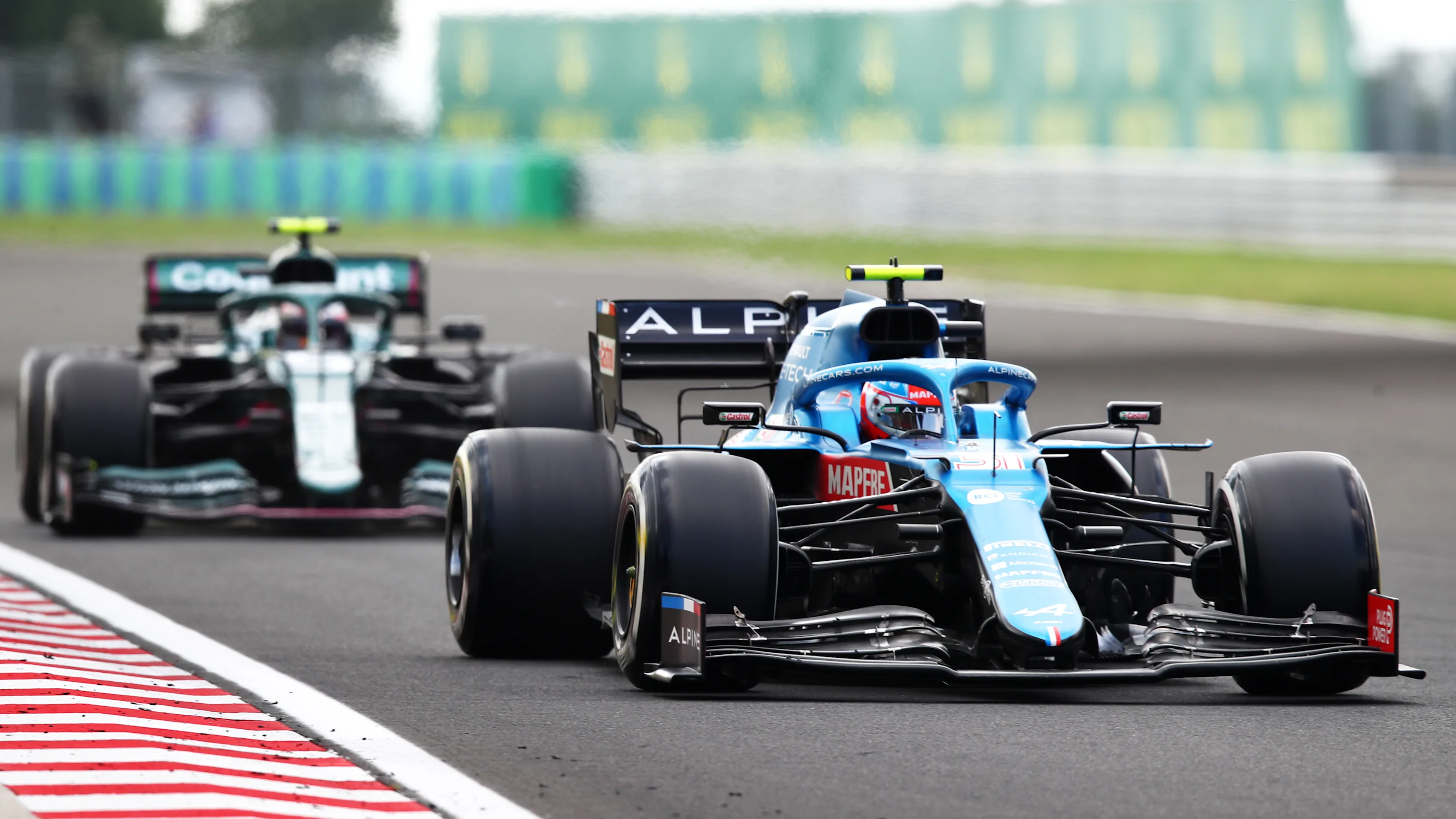 BUDAPEST, HUNGARY - AUGUST 01: Esteban Ocon of France driving the (31) Alpine A521 Renault leads