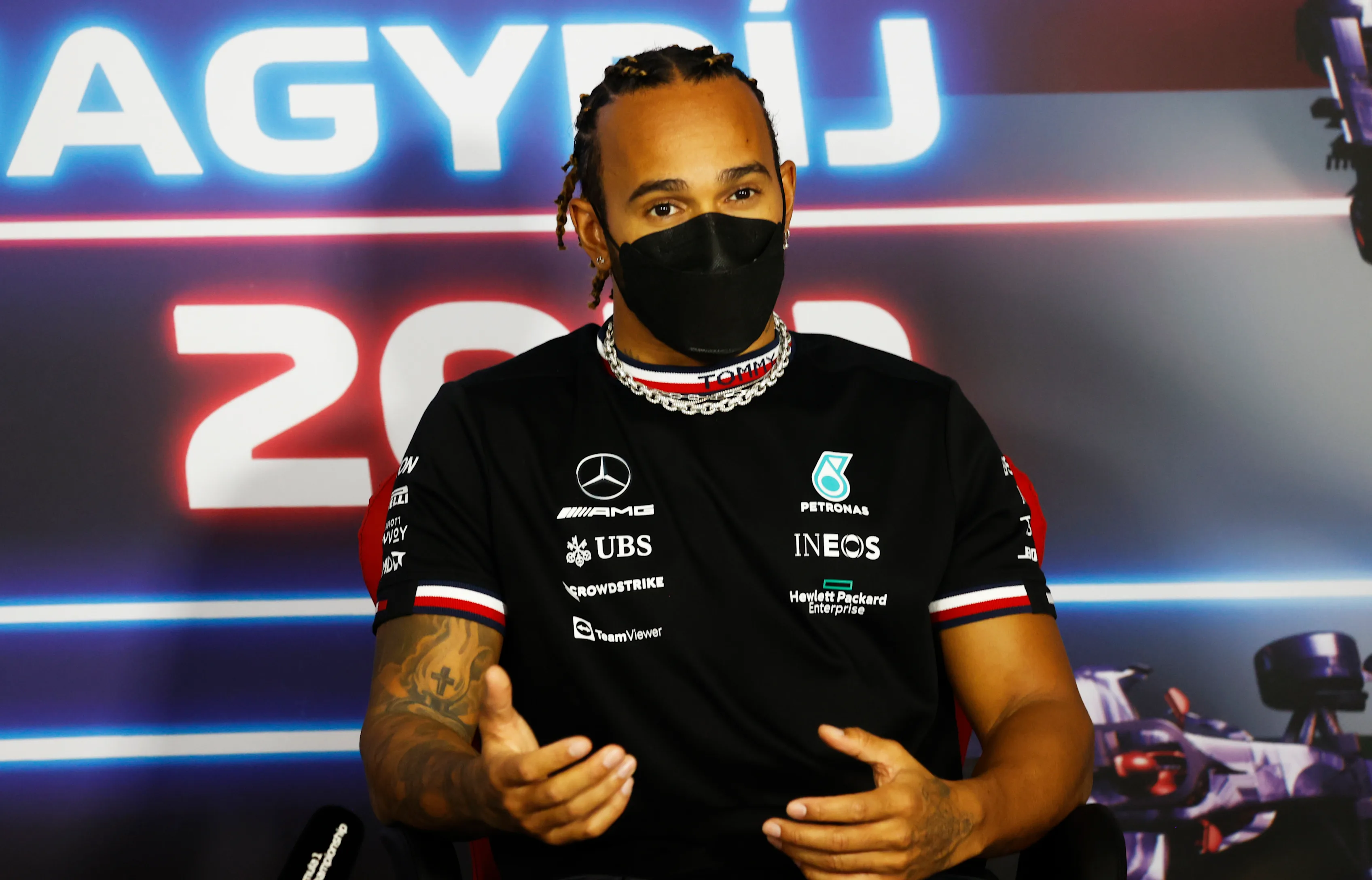 BUDAPEST, HUNGARY - JULY 29: Lewis Hamilton of Great Britain and Mercedes GP talks in the Drivers