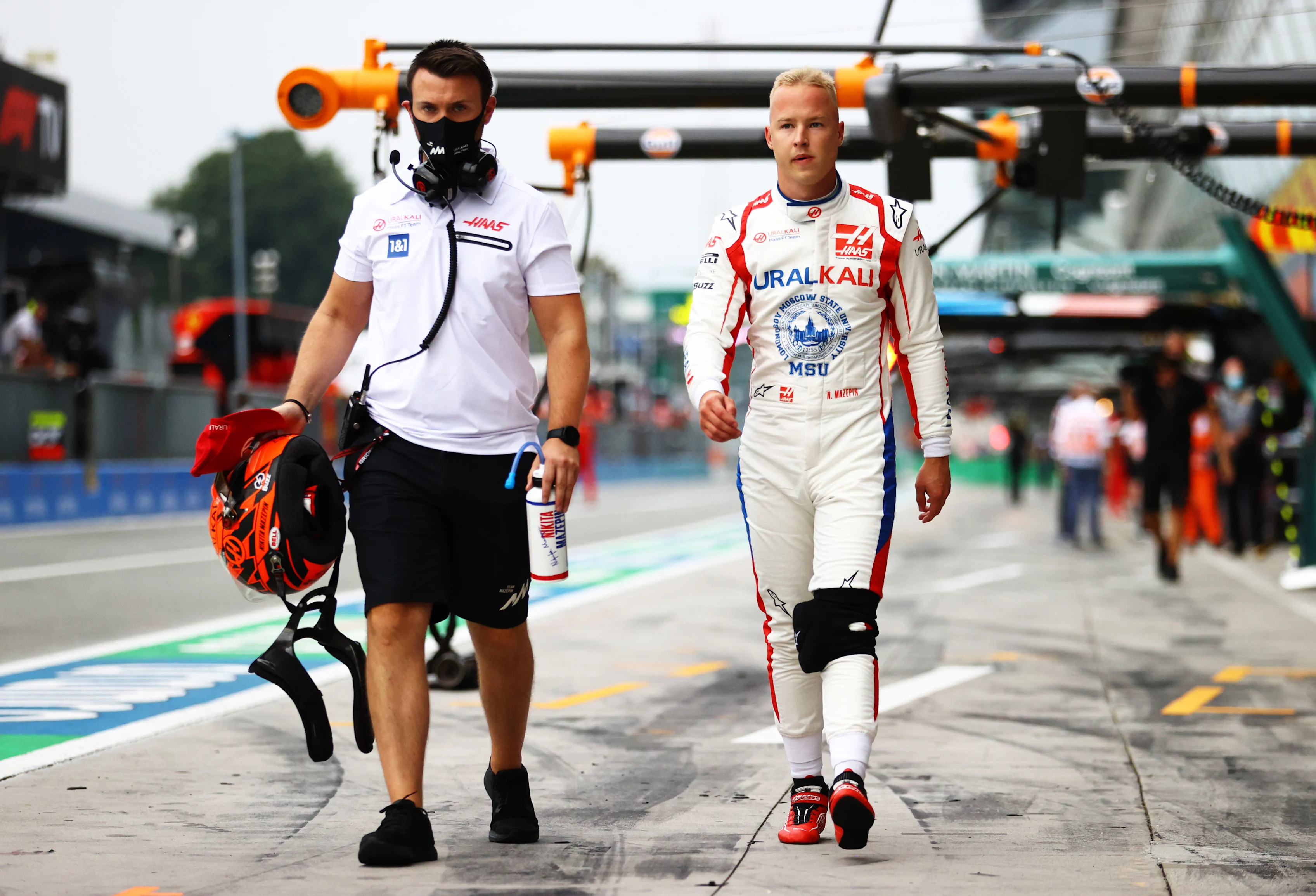 MONZA, ITALY - SEPTEMBER 10: Nikita Mazepin of Russia and Haas F1 walks in the Pitlane during qualifying ahead of the F1 Grand Prix of Italy at Autodromo di Monza on September 10, 2021 in Monza, Italy. (Photo by Bryn Lennon/Getty Images)