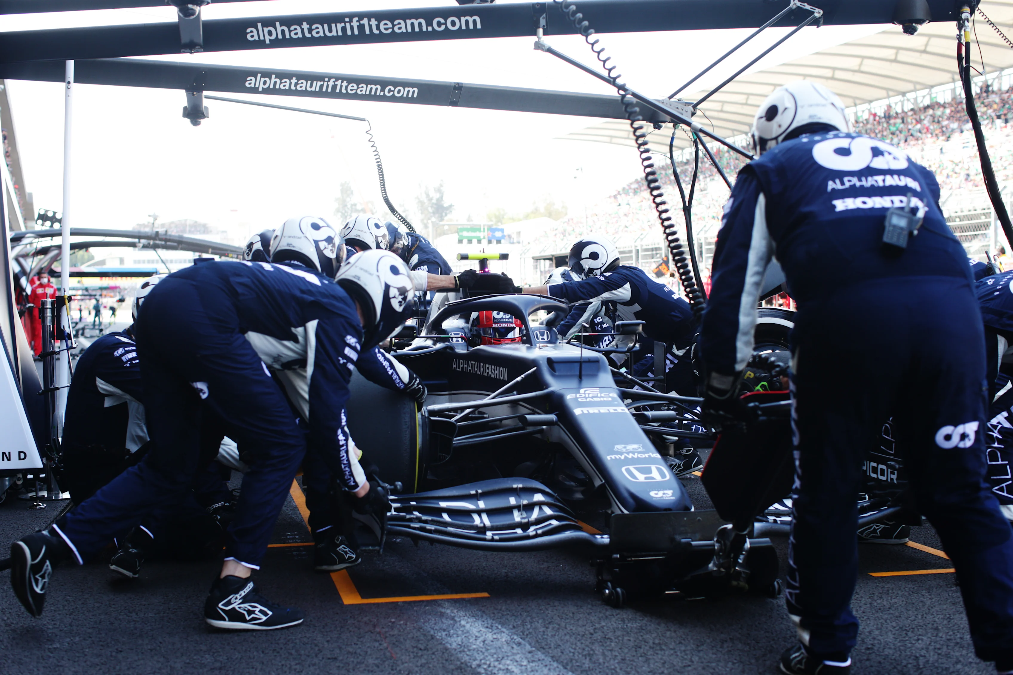 MEXICO CITY, MEXICO - NOVEMBER 07: Pierre Gasly of France driving the (10) Scuderia AlphaTauri AT02 Honda makes a pitstop during the F1 Grand Prix of Mexico at Autodromo Hermanos Rodriguez on November 07, 2021 in Mexico City, Mexico. (Photo by Peter Fox/Getty Images)