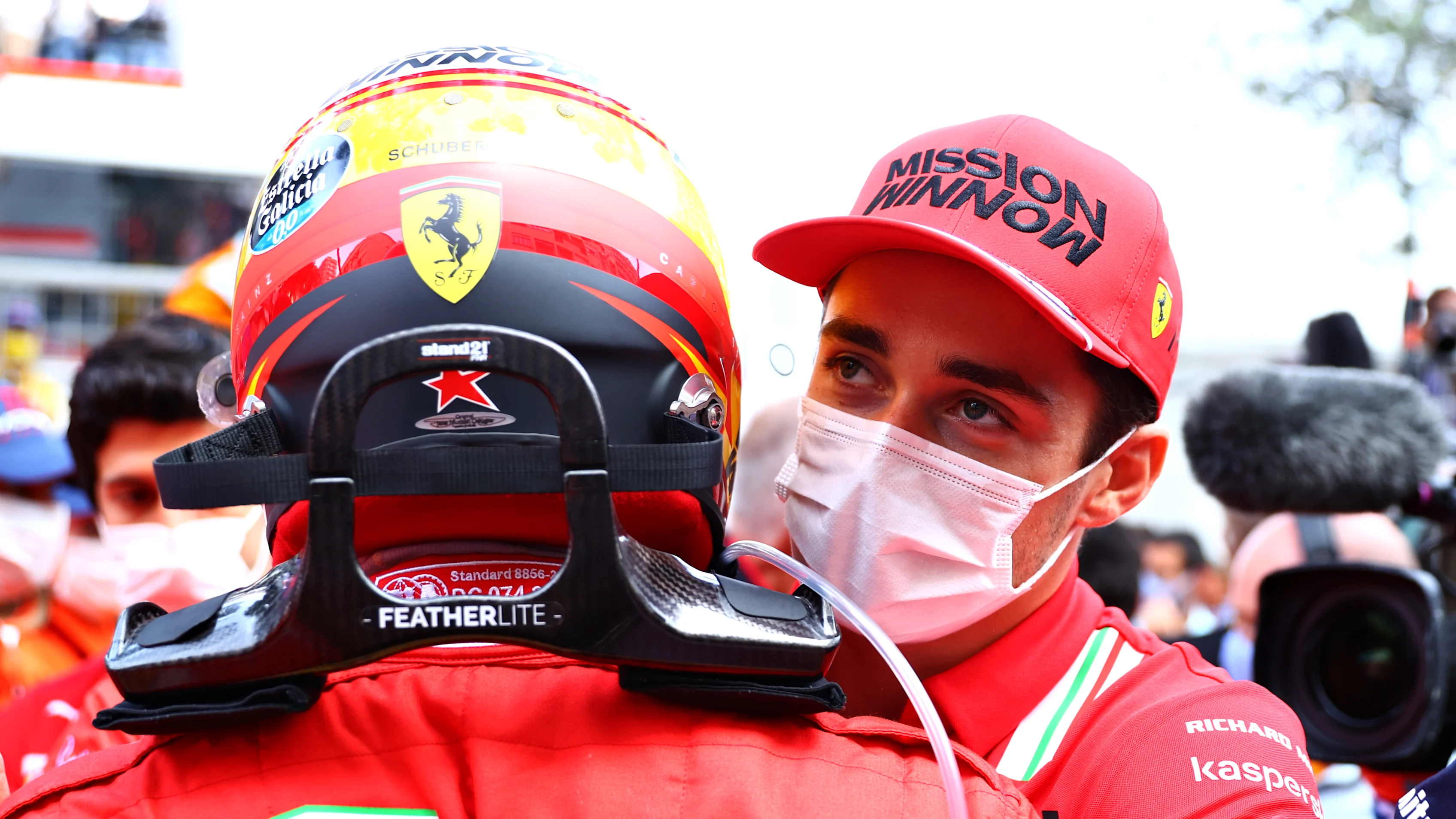 MONTE-CARLO, MONACO - MAY 23: Second placed Carlos Sainz of Spain and Ferrari is congratulated by