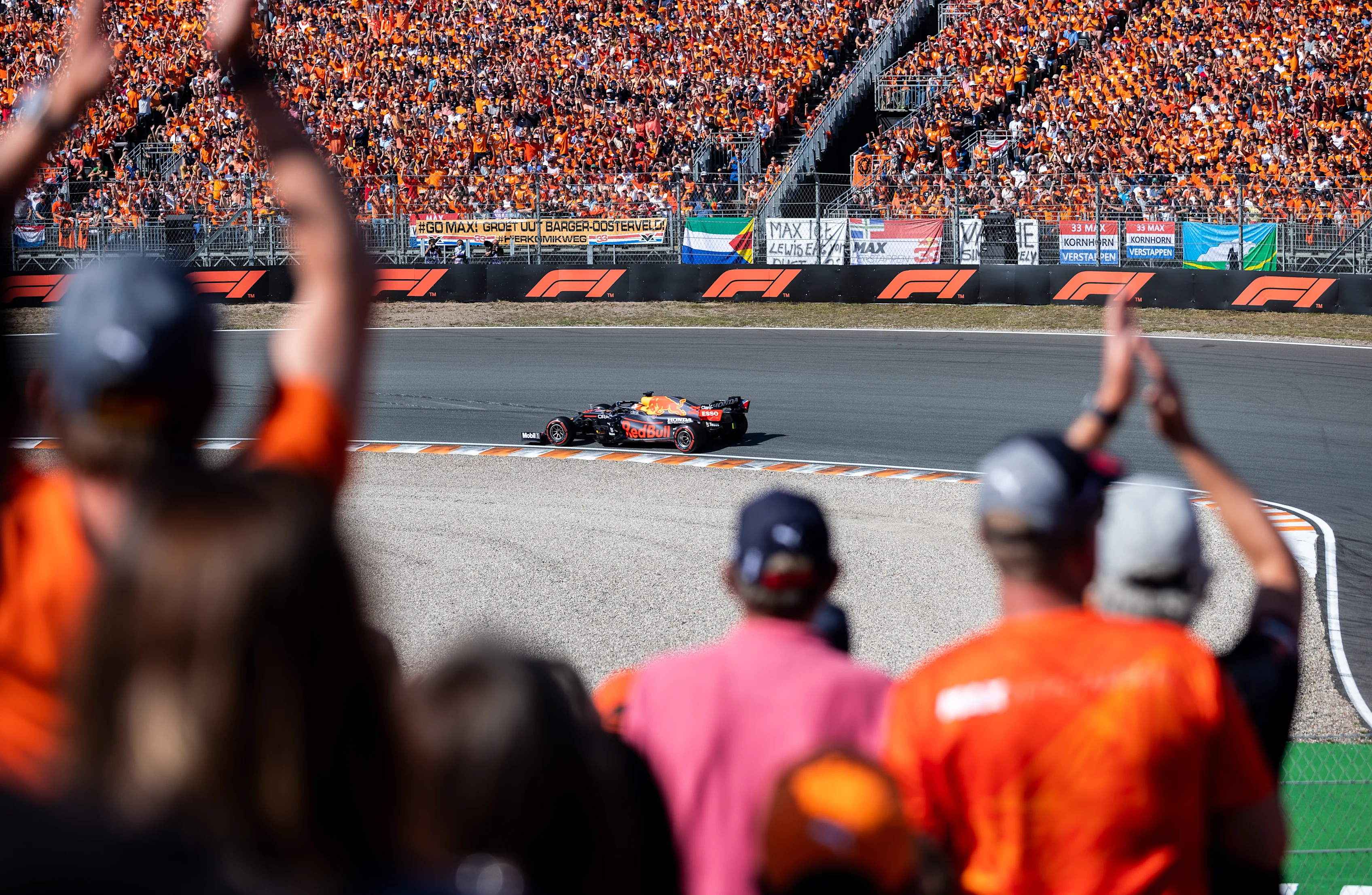 ZANDVOORT, NETHERLANDS - SEPTEMBER 05: Fans celebrate Max Verstappen of the Netherlands driving the