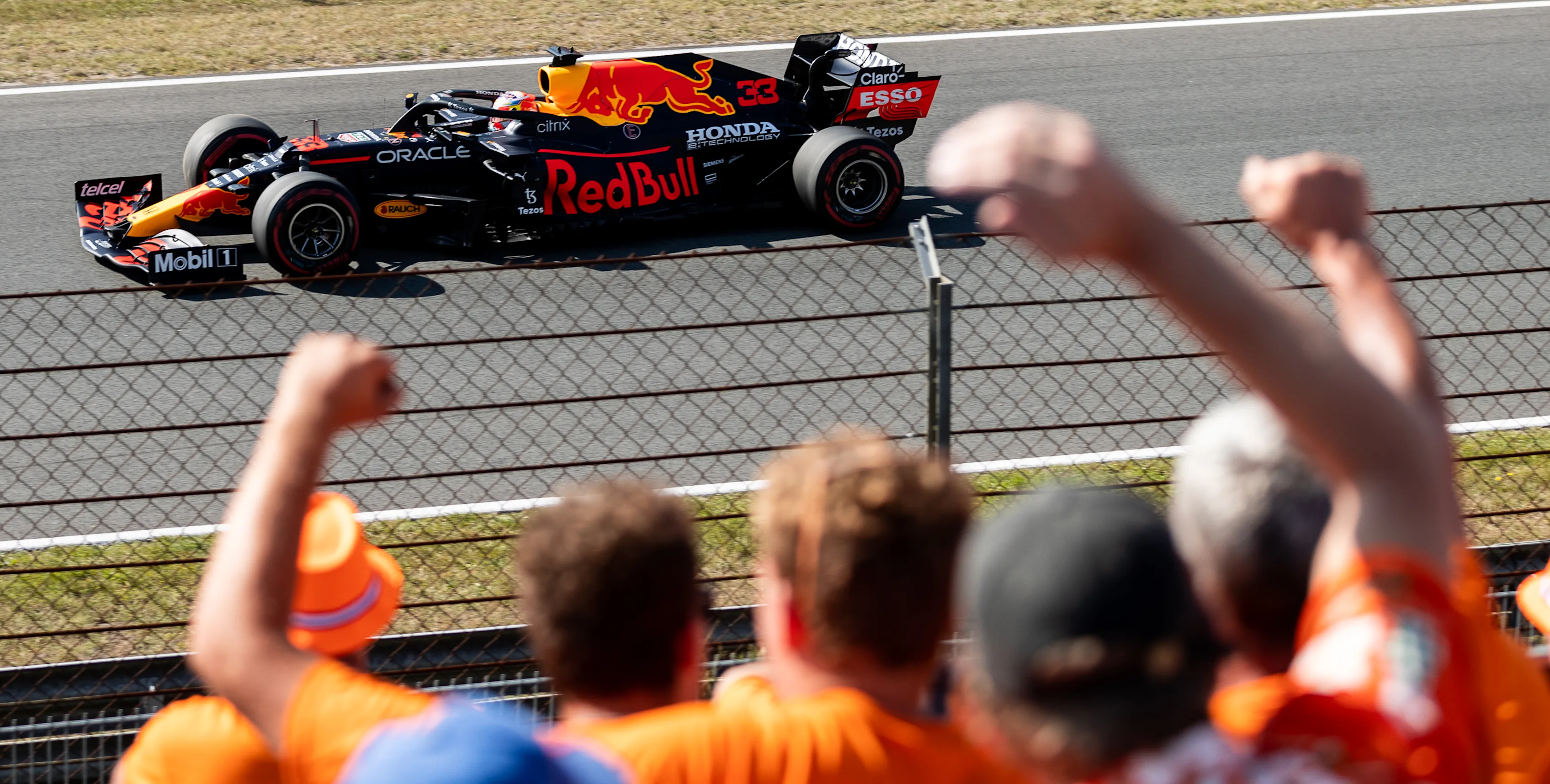 ZANDVOORT, NETHERLANDS - SEPTEMBER 05: Fans celebrate Max Verstappen of the Netherlands driving the