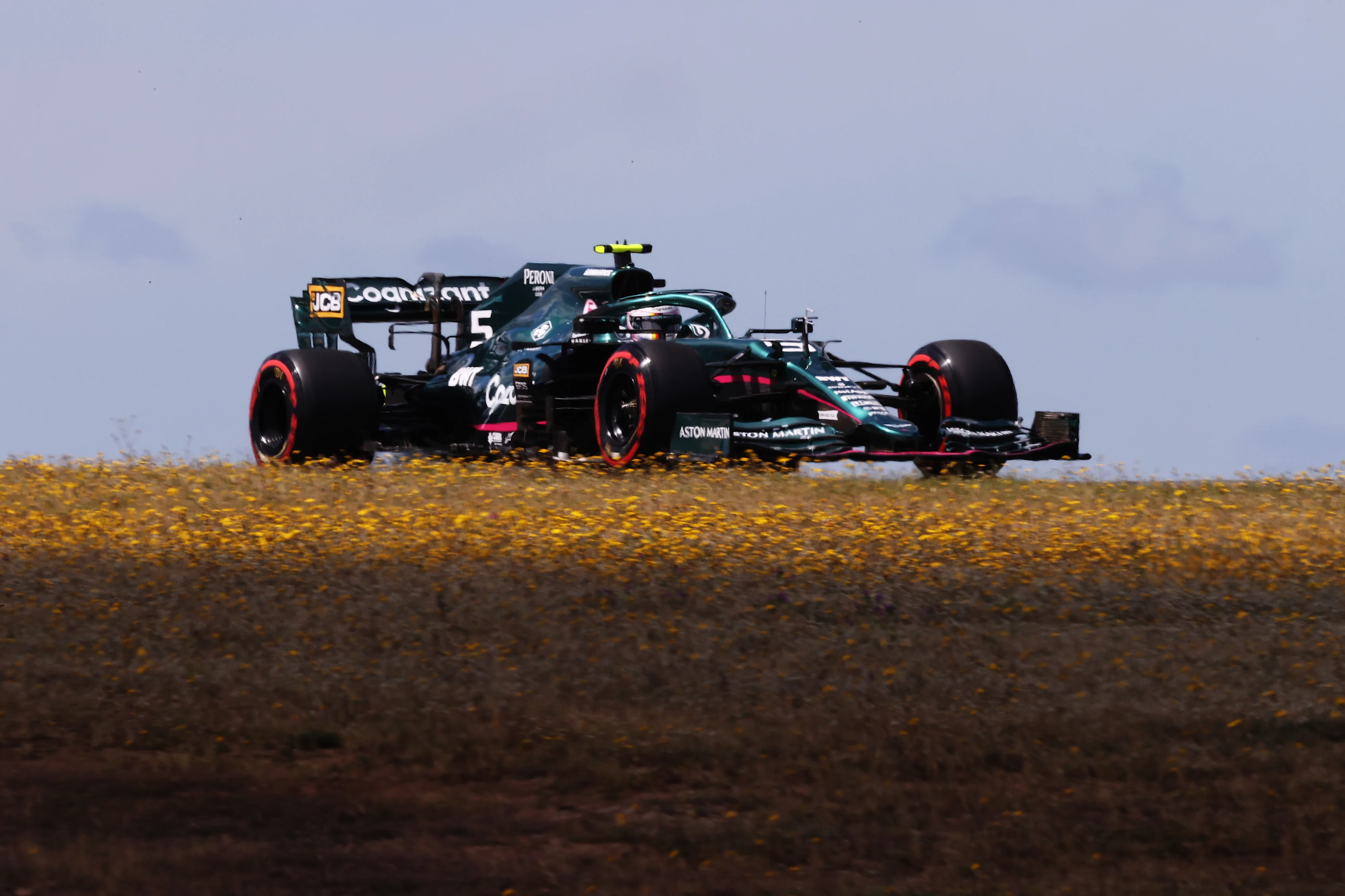 PORTIMAO, PORTUGAL - APRIL 30: Sebastian Vettel of Germany driving the (5) Aston Martin AMR21 Mercedes on track during practice ahead of the F1 Grand Prix of Portugal at Autodromo Internacional Do Algarve on April 30, 2021 in Portimao, Portugal. (Photo by Lars Baron/Getty Images)