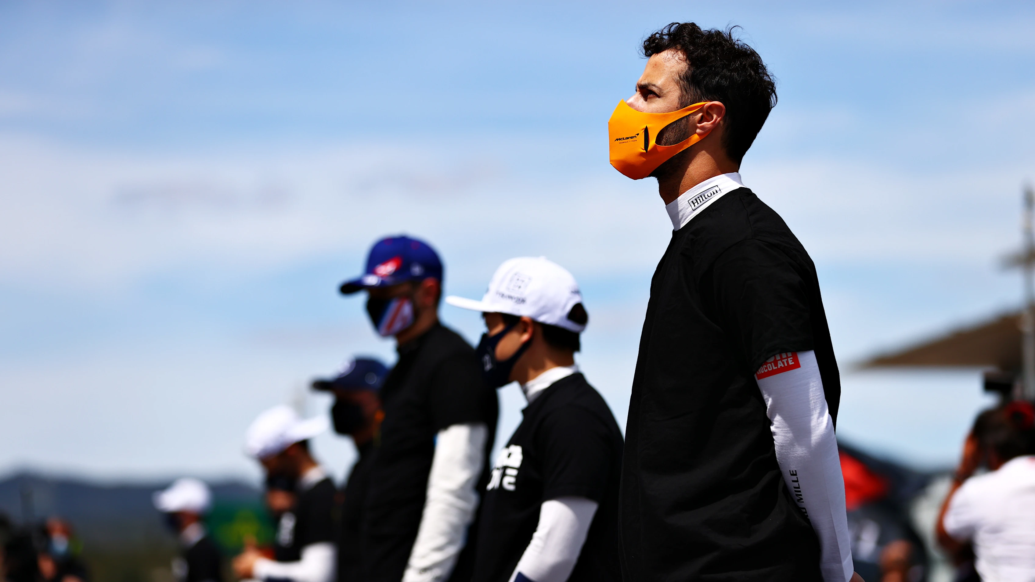 PORTIMAO, PORTUGAL - MAY 02: Daniel Ricciardo of Australia and McLaren F1 stands for the national anthem prior to the F1 Grand Prix of Portugal at Autodromo Internacional Do Algarve on May 02, 2021 in Portimao, Portugal. (Photo by Dan Istitene - Formula 1/Formula 1 via Getty Images)