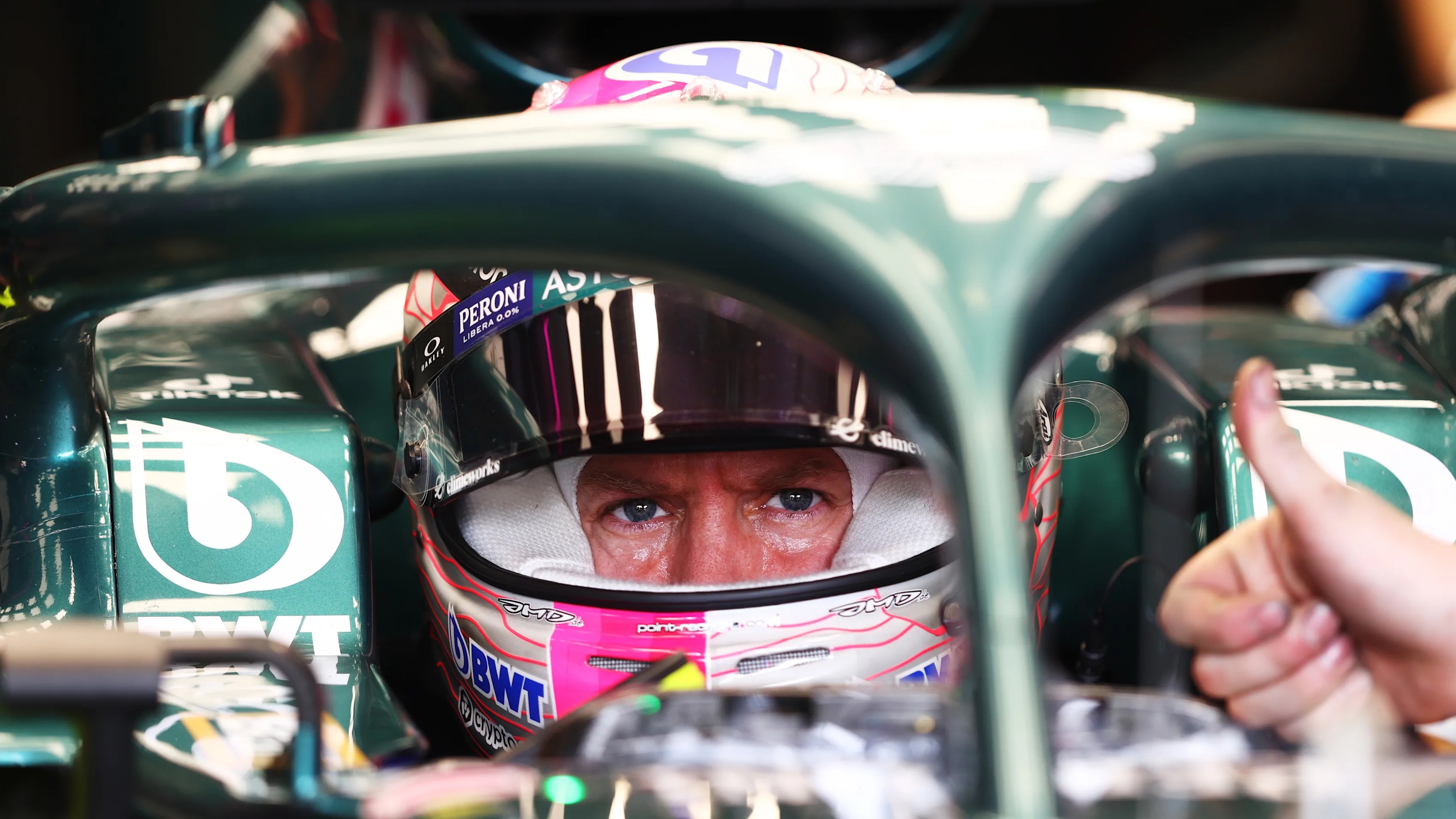 DOHA, QATAR - NOVEMBER 19: Sebastian Vettel of Germany and Aston Martin F1 Team prepares to drive in the garage during practice ahead of the F1 Grand Prix of Qatar at Losail International Circuit on November 19, 2021 in Doha, Qatar. (Photo by Dan Istitene - Formula 1/Formula 1 via Getty Images)