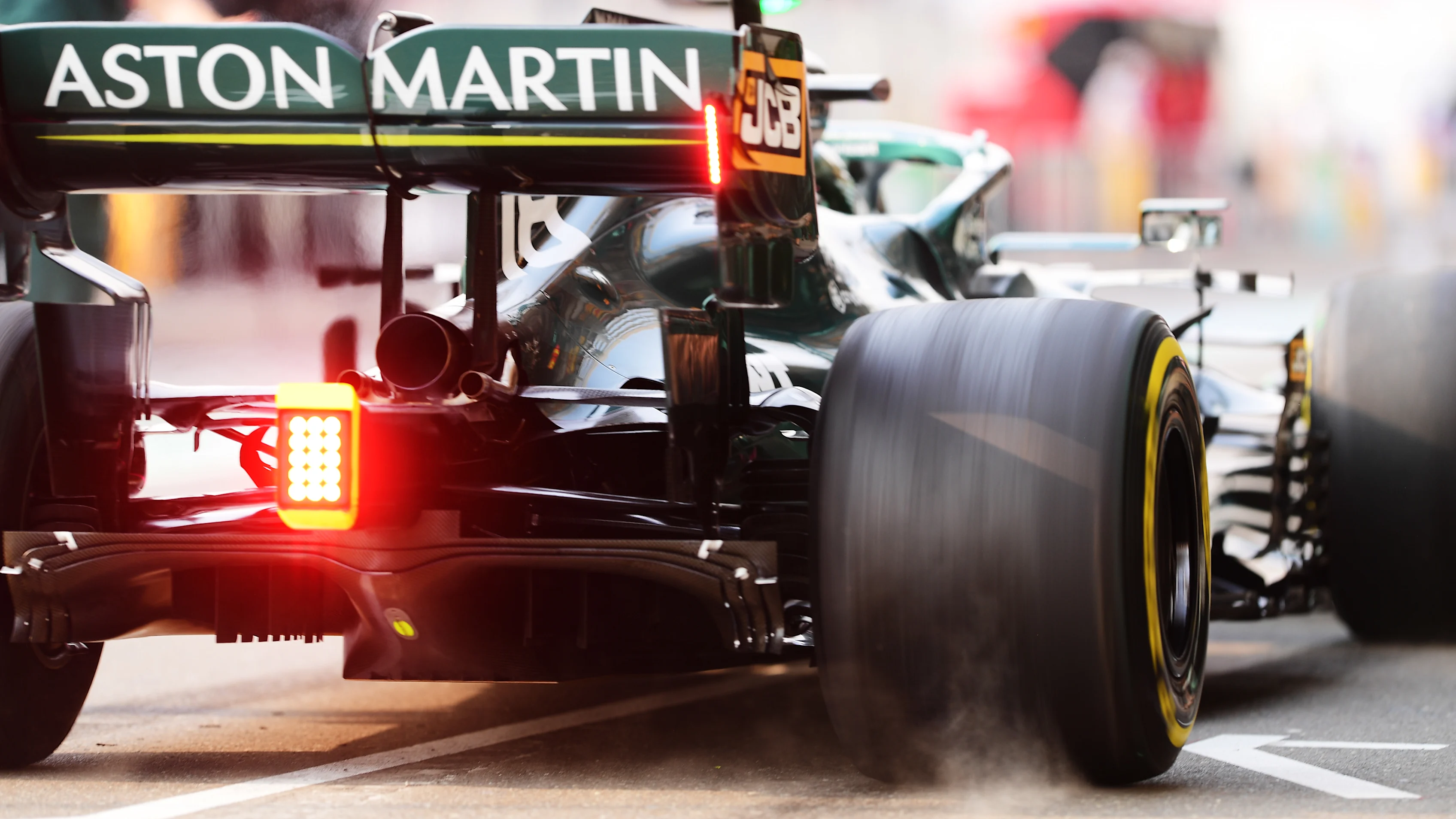 DOHA, QATAR - NOVEMBER 20: Lance Stroll of Canada driving the (18) Aston Martin AMR21 Mercedes in