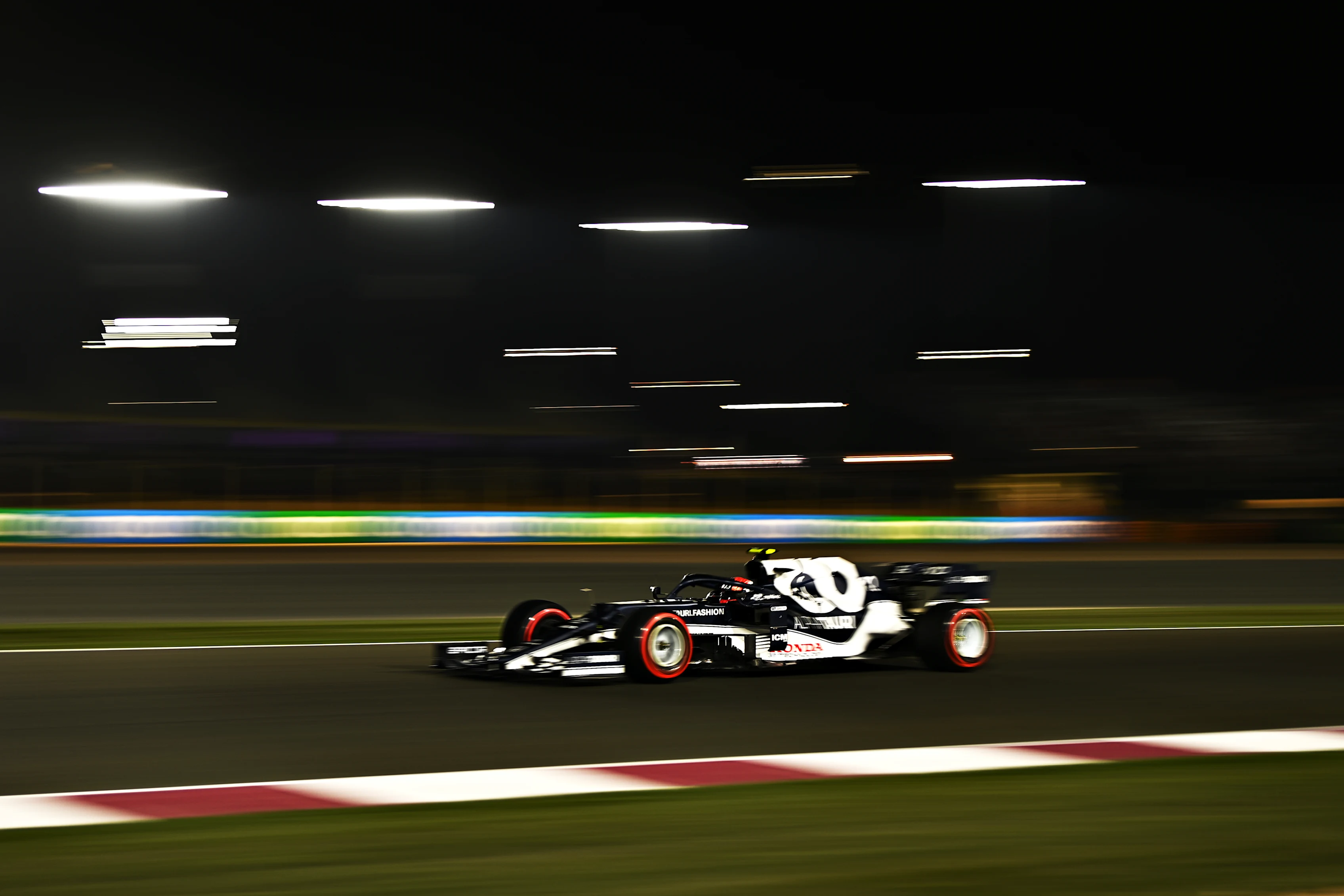 DOHA, QATAR - NOVEMBER 20: Pierre Gasly of France driving the (10) Scuderia AlphaTauri AT02 Honda during qualifying ahead of the F1 Grand Prix of Qatar at Losail International Circuit on November 20, 2021 in Doha, Qatar. (Photo by Clive Mason/Getty Images)