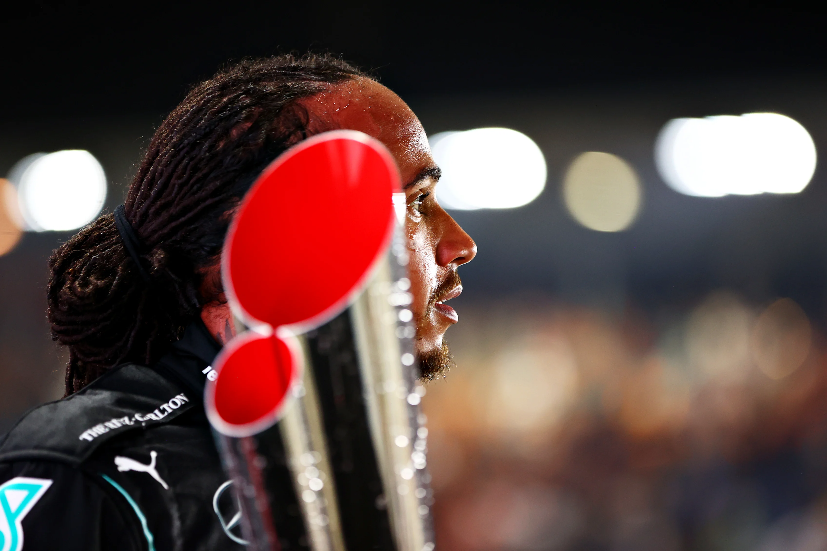 DOHA, QATAR - NOVEMBER 21: Race winner Lewis Hamilton of Great Britain and Mercedes GP celebrates