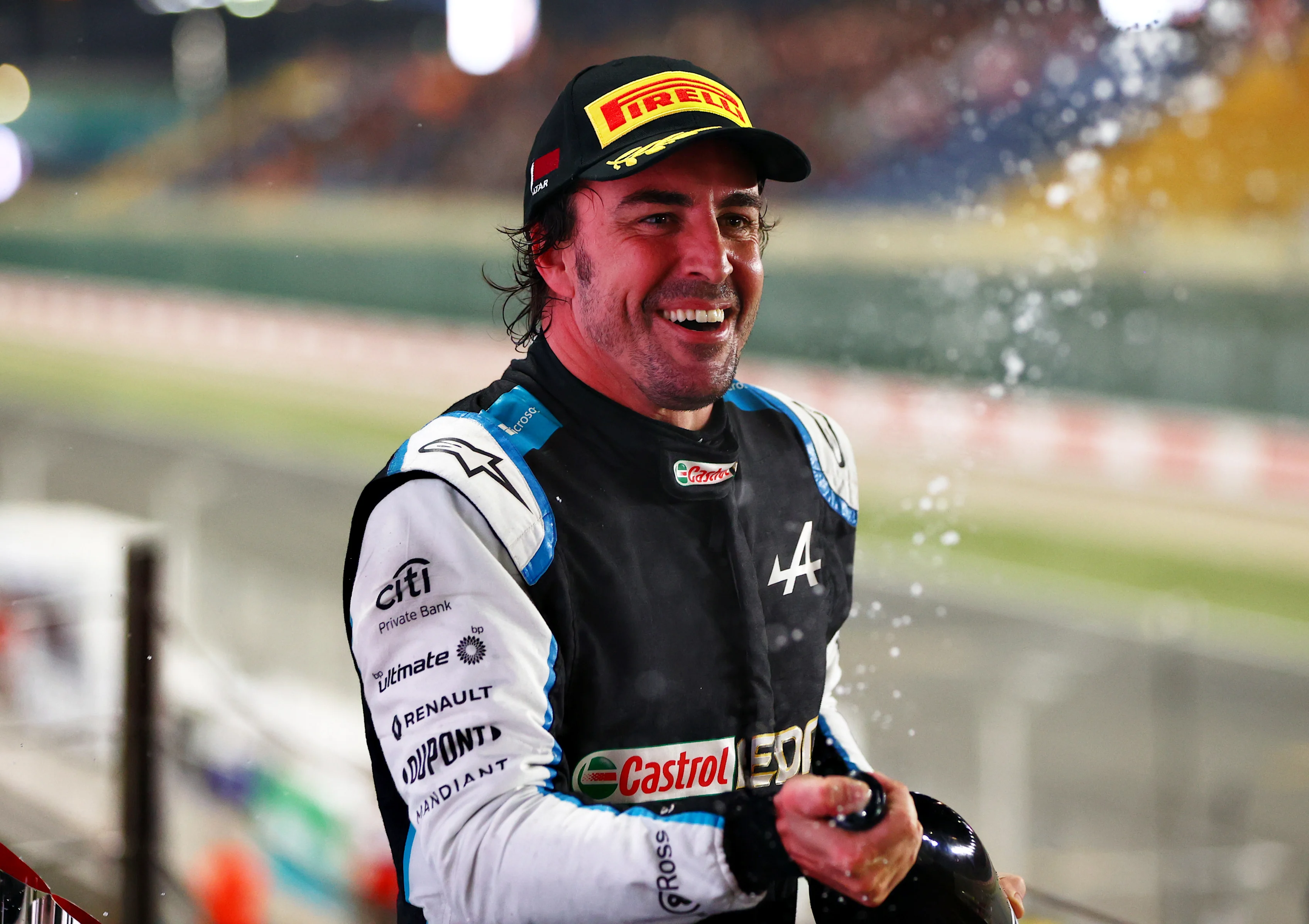 DOHA, QATAR - NOVEMBER 21: Third placed Fernando Alonso of Spain and Alpine F1 Team celebrates on